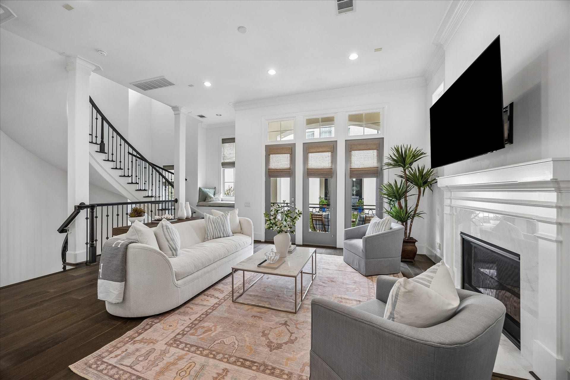 1208 Mosaico Lane, Houston, TX 77055 second floor view of living area (windows to balcony)
