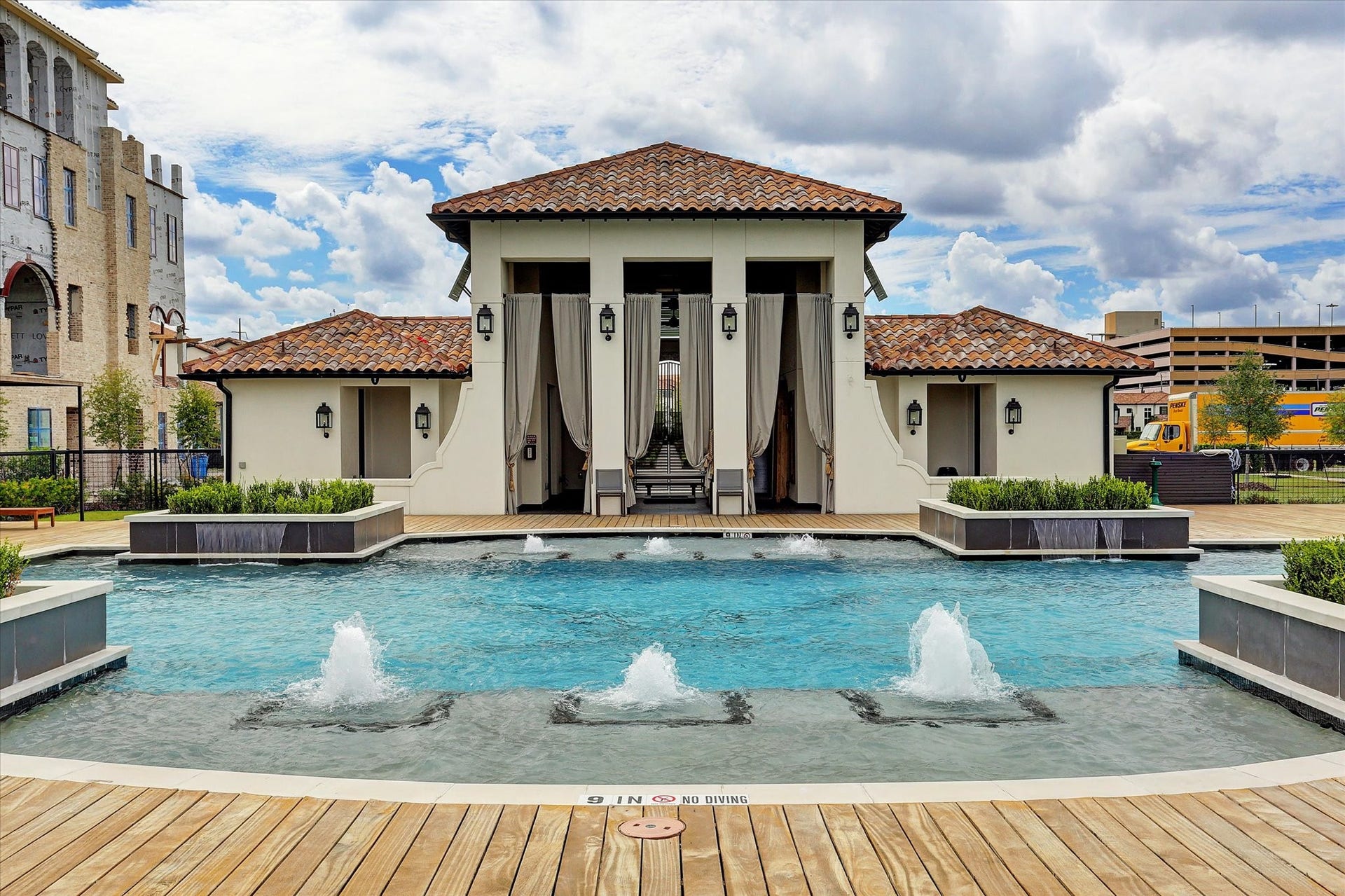 1208 Mosaico Lane, Houston, TX 77055 view of cabana building from pool