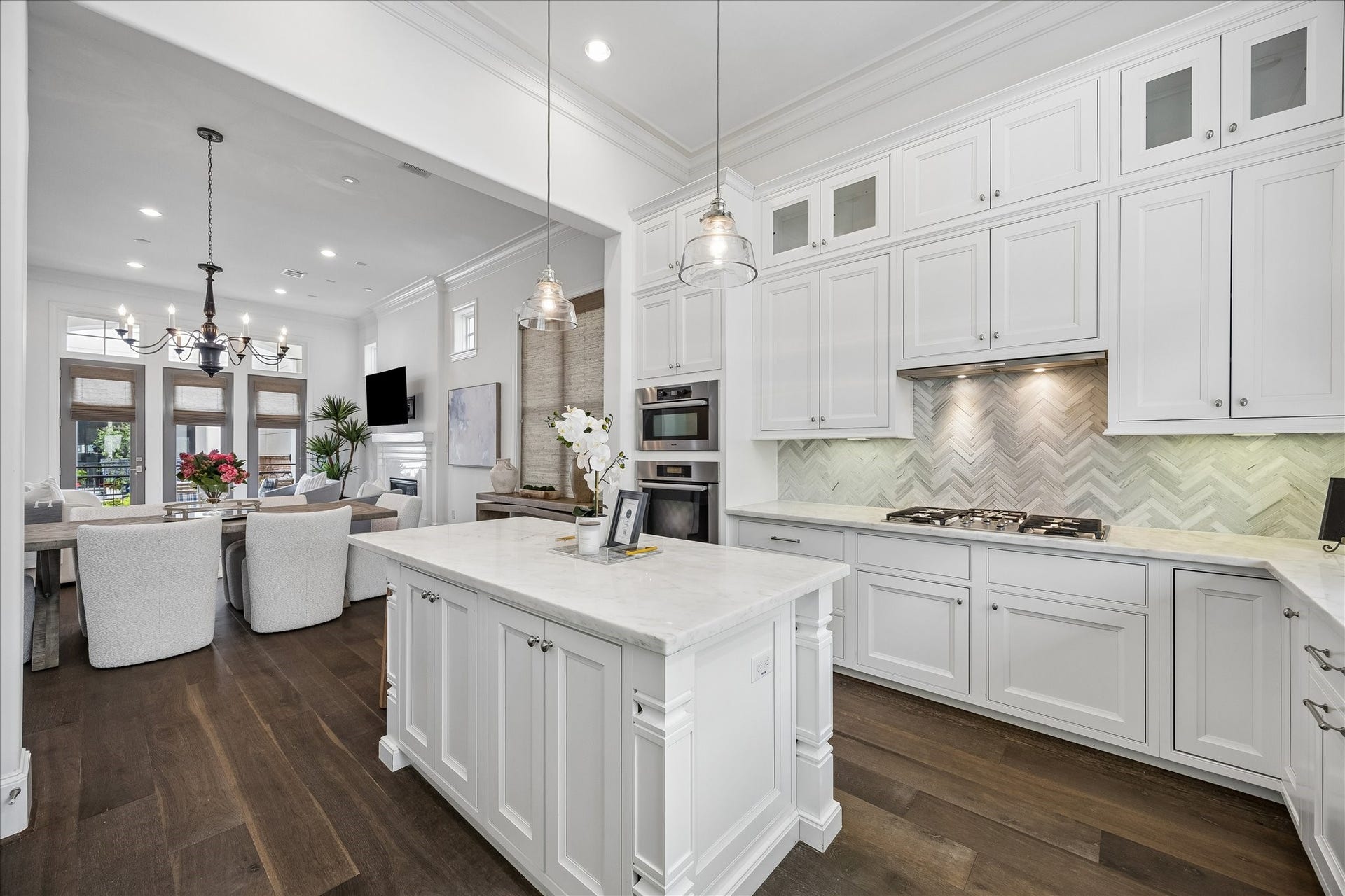 1208 Mosaico Lane, Houston, TX 77055 kitchen with island, pantry and built in stainless fridge