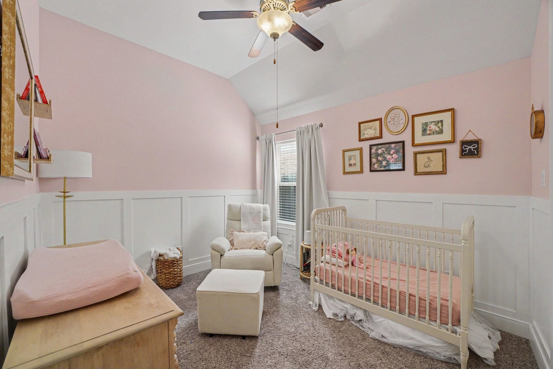 26438 Morgan Creek Lane, Katy, TX 77494 This charming secondary bedroomcurrently styled as a sweet, elegant nurseryoffers a bright and cozy space filled with thoughtful architectural details.