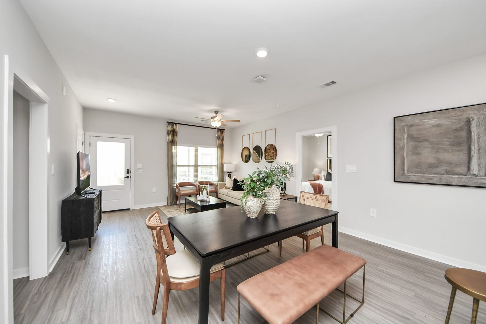 Boasting luxury finishes-stylish Island kitchen,granite counters,subway tile backsplash,ample custom cabinet space,stainless appliances,refrigerator,full size washer&dryer included,wood-like flooring throughout,open concept floor plan.