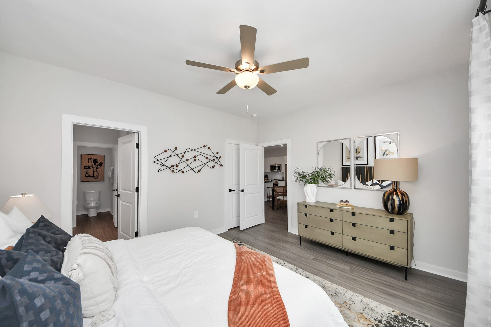 Primary Suite offers walk-closet,bath w/dual vanities&lux tub/shower.