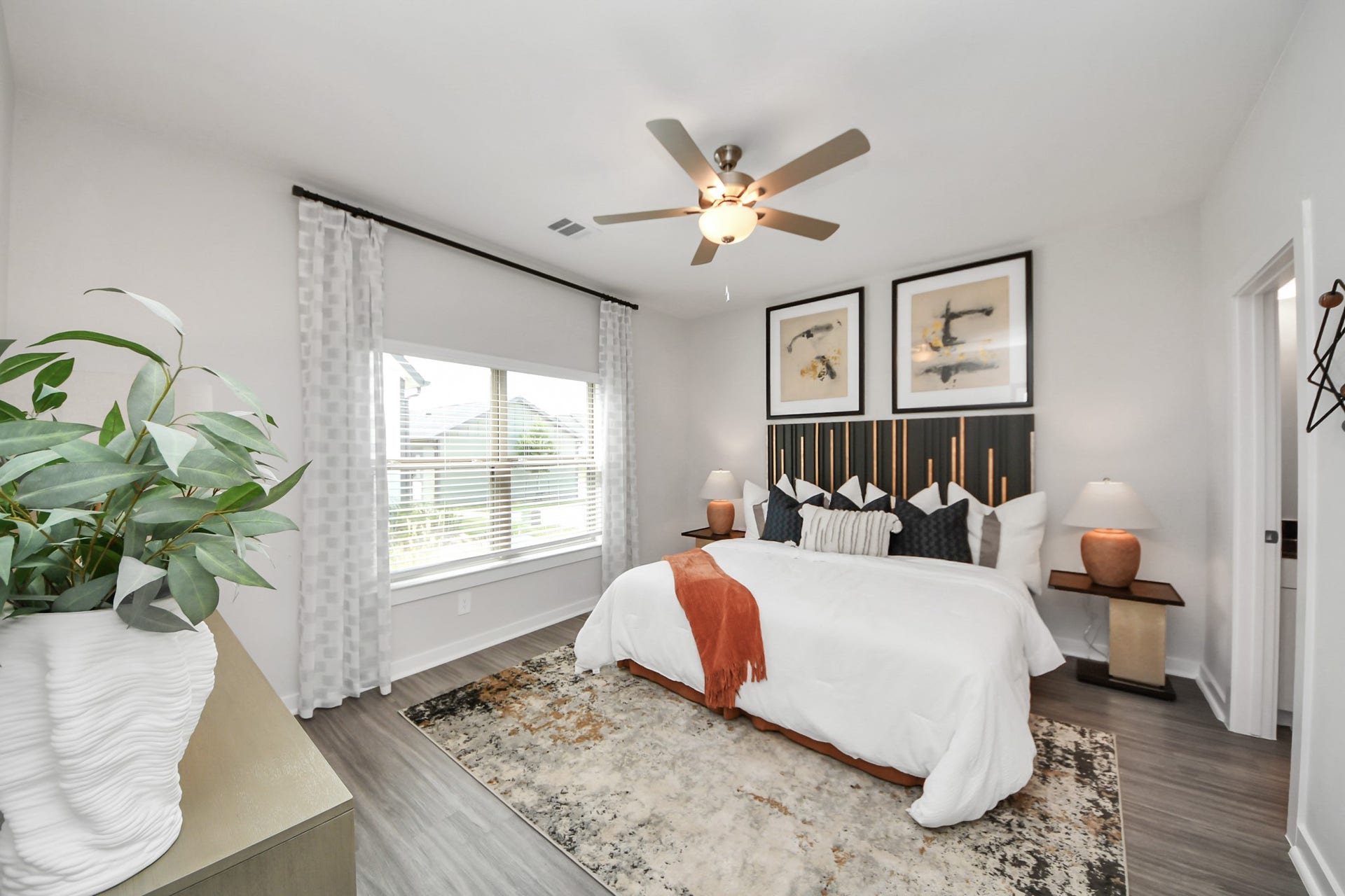 Primary Suite offers walk-closet,bath w/dual vanities&lux tub/shower.