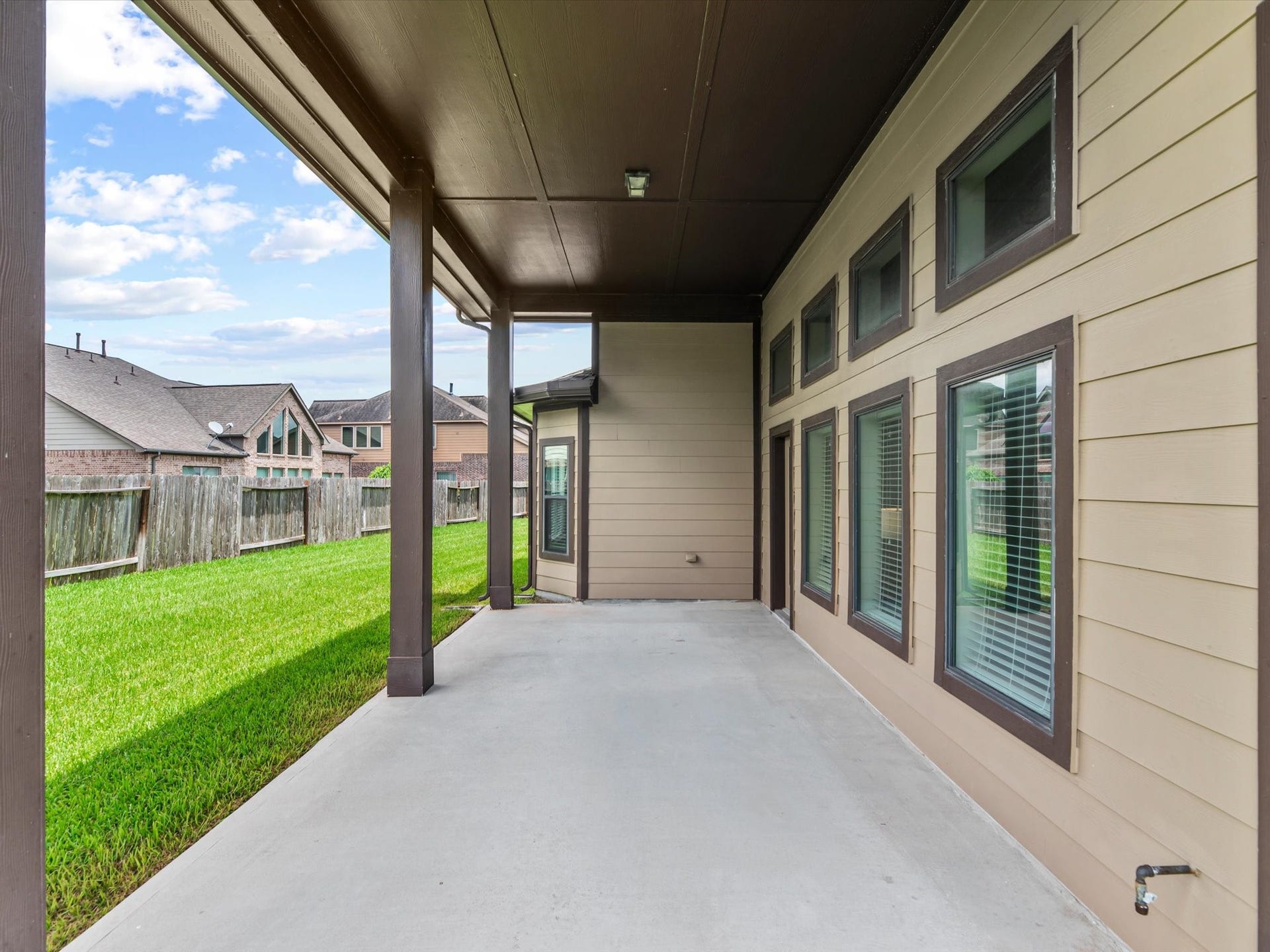 4302 Kent Ranch Court, Katy, TX 77494 COVERED PATIO THAT FACES THE NORTH WITH EXCELLENT VIEWS OF THE MASSIVE PIE SHAPED CUL DU SAC LOT.