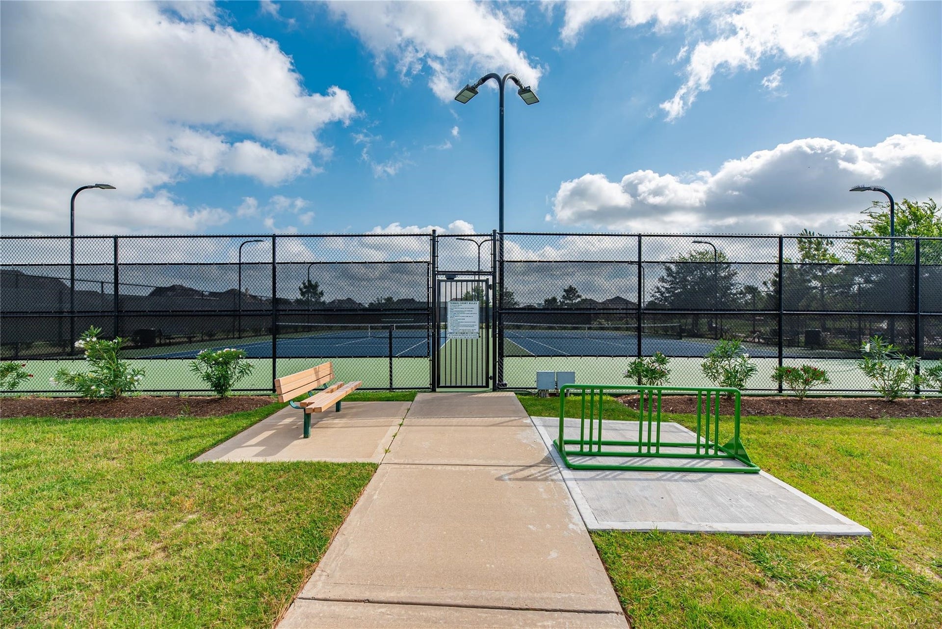 4302 Kent Ranch Court, Katy, TX 77494 Enjoy the community tennis courts in Pine Mill Ranch, providing a convenient space for recreation, exercise, and friendly competition just minutes from home.