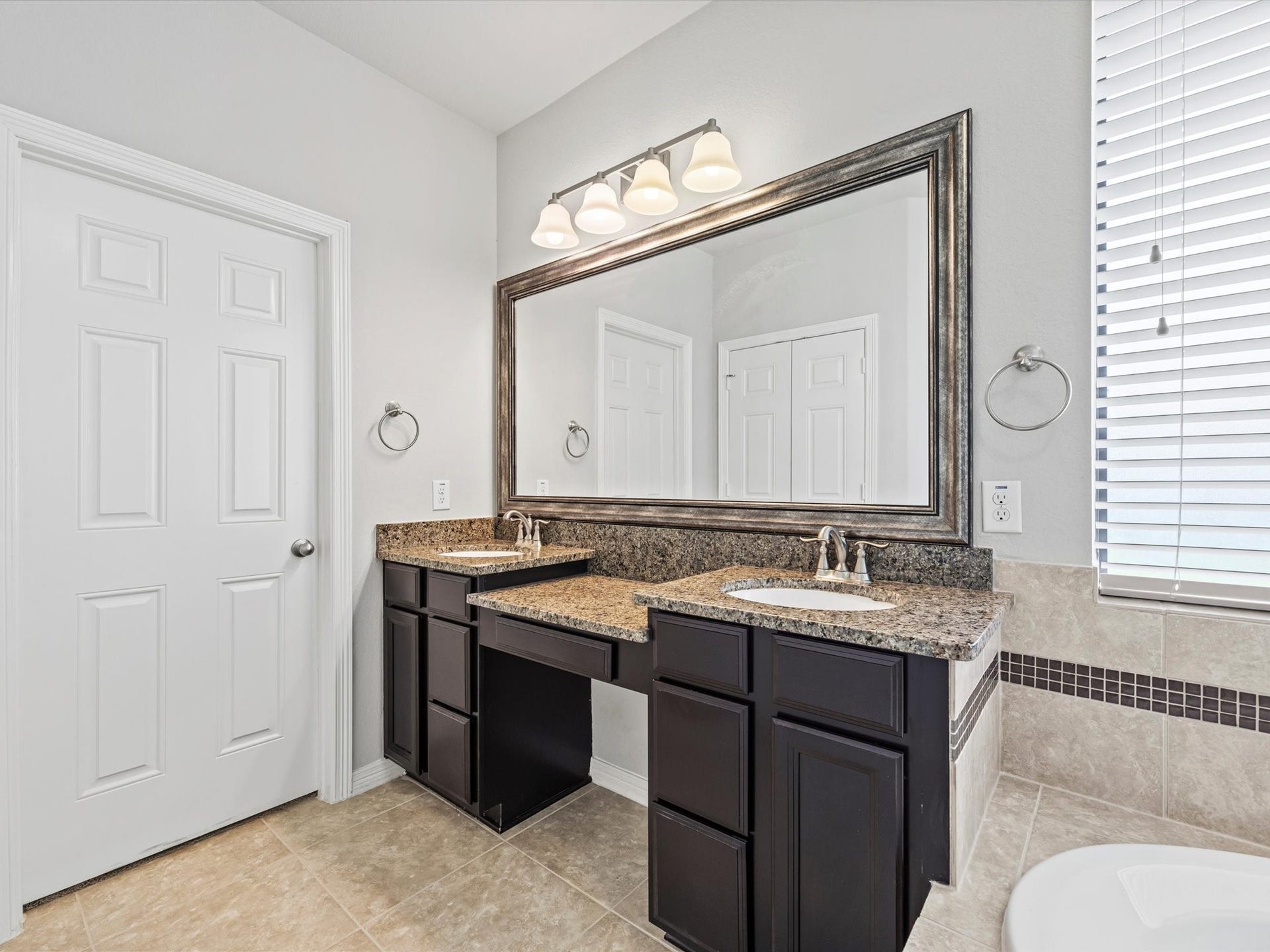 4302 Kent Ranch Court, Katy, TX 77494 Well-appointed layout creates a relaxing retreat while offering plenty of room for morning routines.