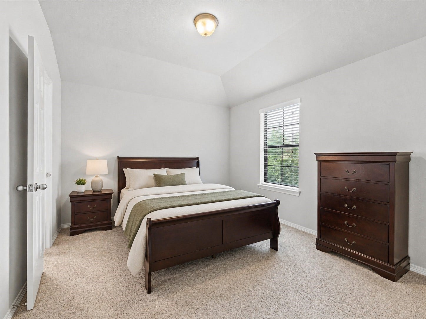 4302 Kent Ranch Court, Katy, TX 77494 Virtually staged with bedding added to bed. This room measures 12'9" x 11'9"
