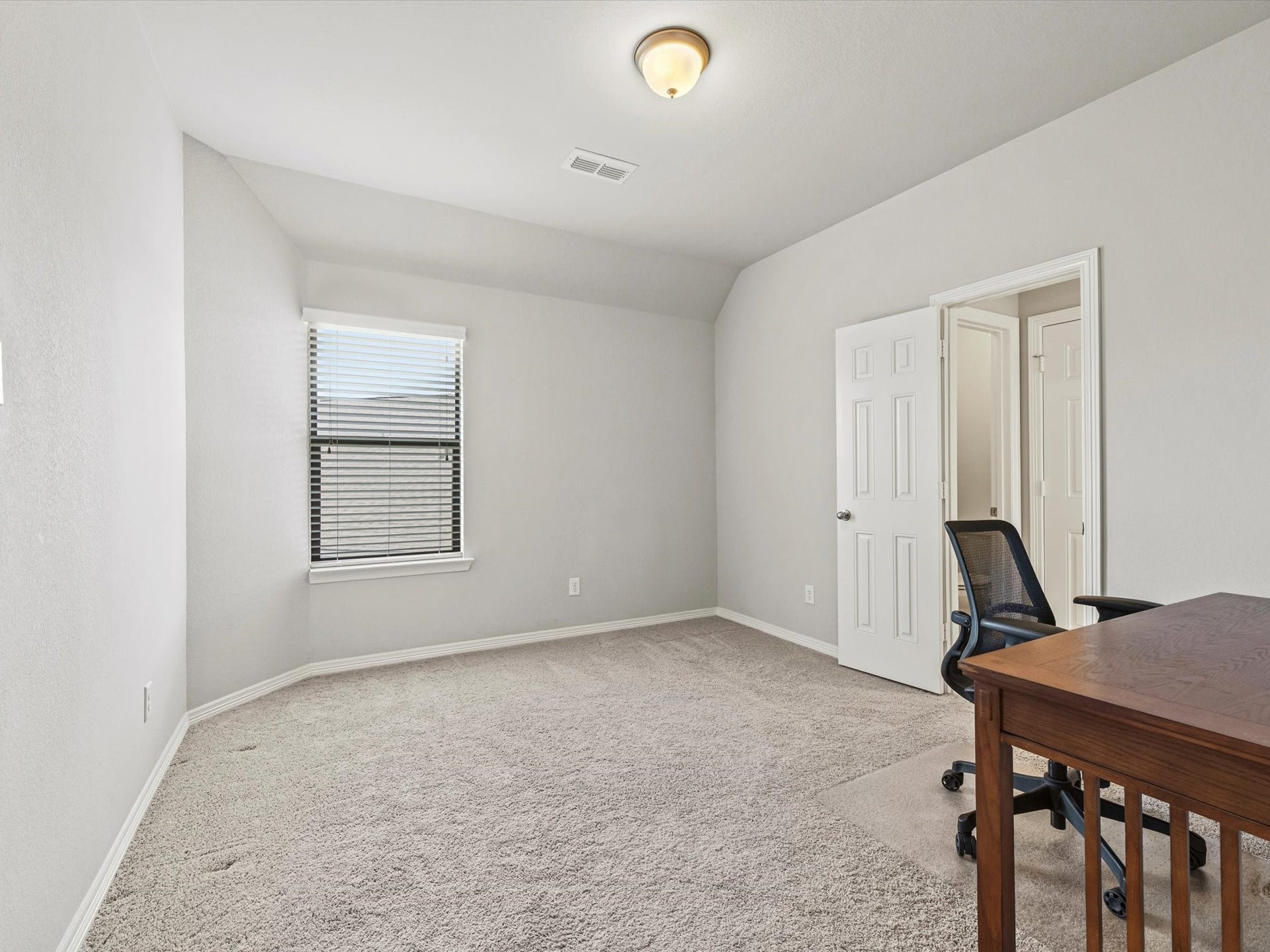 4302 Kent Ranch Court, Katy, TX 77494 BEDROOM BEING USED AS AN OFFICE ON THE SECOND FLOOR. This room measures 12'9" x 12'8".