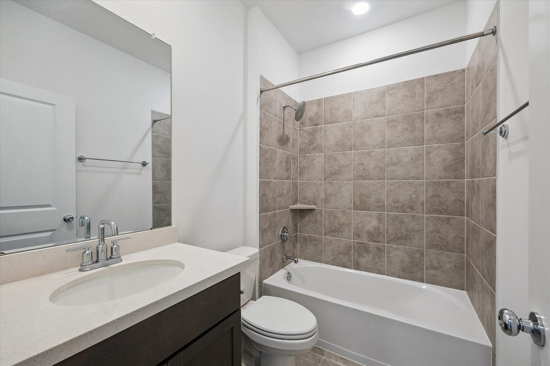 9510 Honey Run Lane, Cypress, TX 77433 A full bathroom down for your guests.