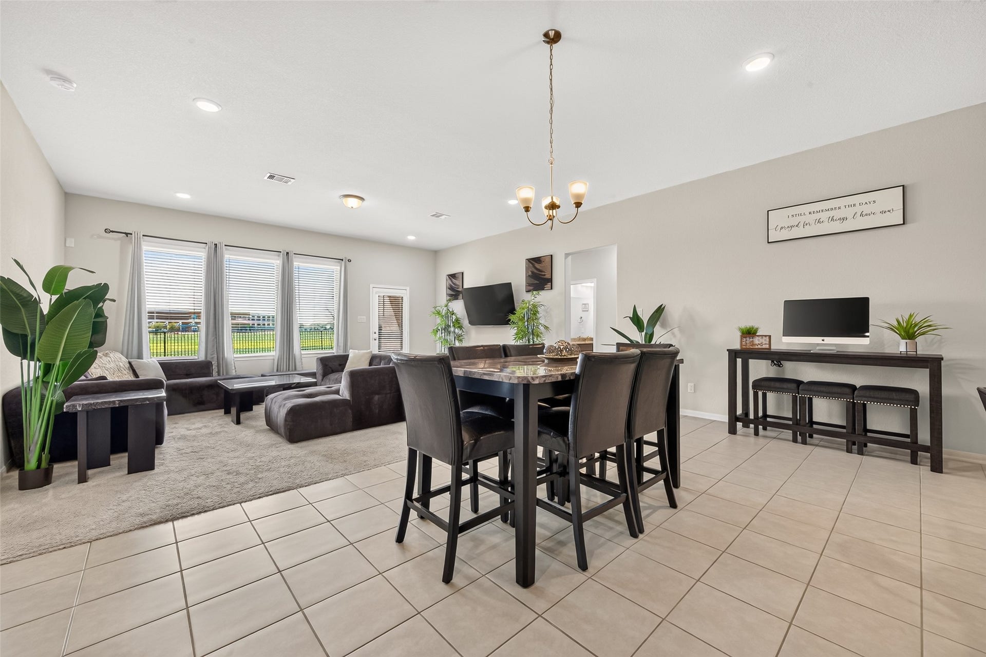 10707 Amador Peak Drive, Rosharon, TX 77583 Grand living-dining combo, perfect space for entertaining and communing. Inquire about furniture, most available.