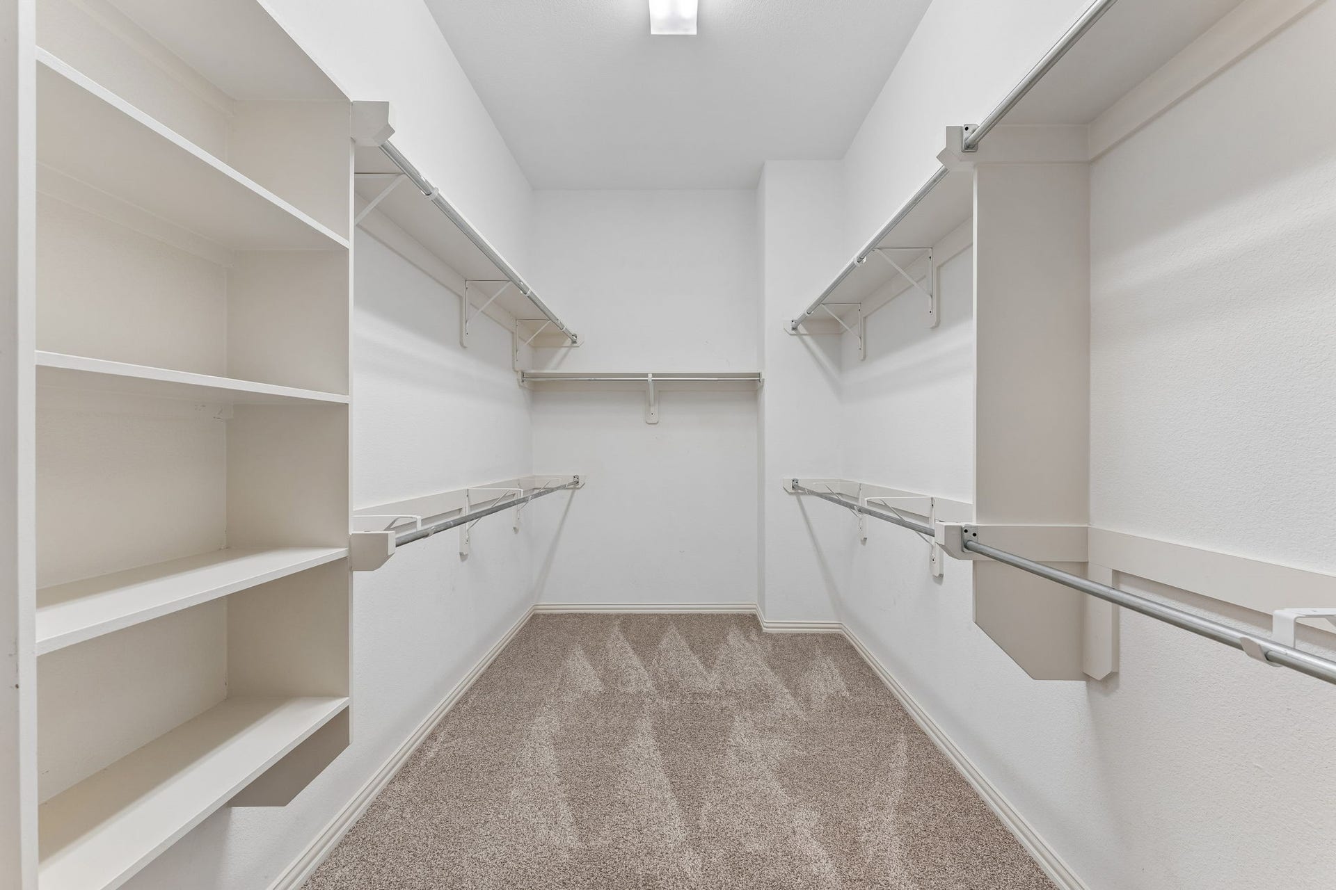 8210 Thunder Ridge Way, Missouri City, TX 77459 Spacious walk-in closet with ample shelving and hanging space.