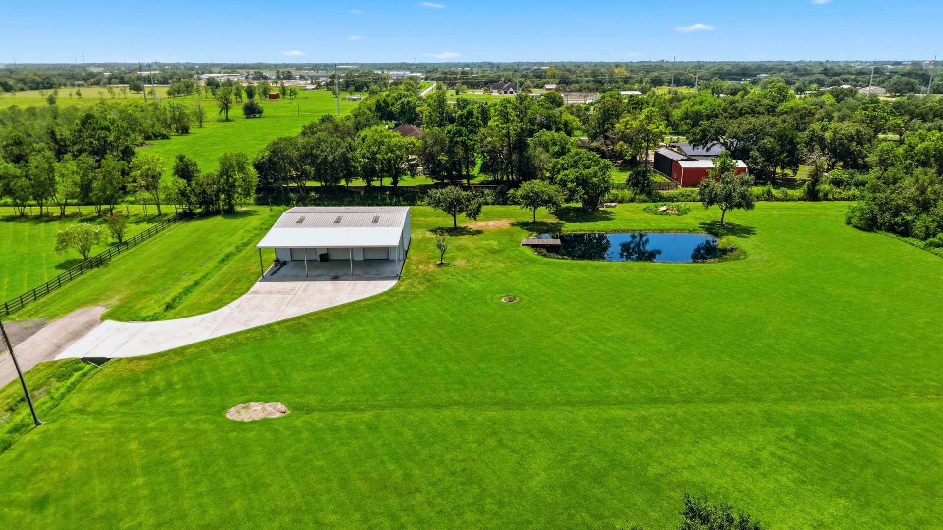 835 Hall Road, Alvin, TX 77511 Aerial view highlighting the detached shop and expansive grounds