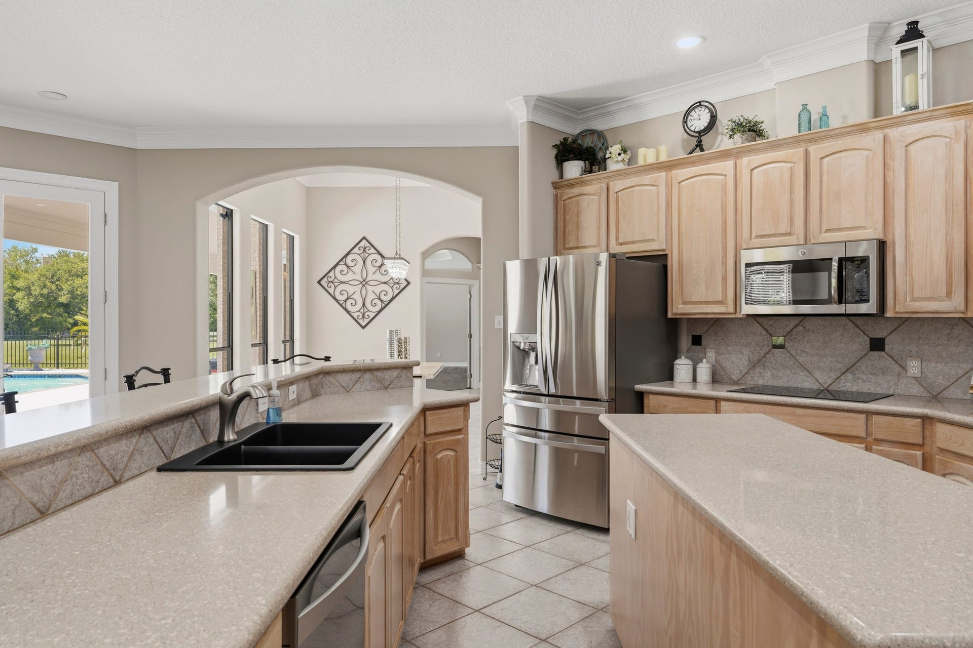 835 Hall Road, Alvin, TX 77511 Open-concept kitchen designed for everyday living and entertaining