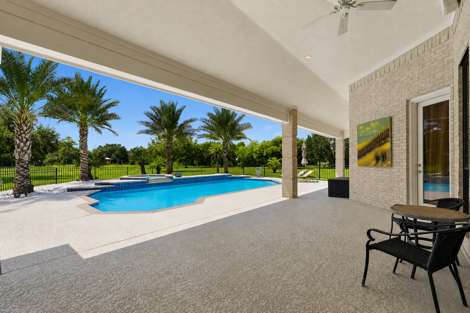 835 Hall Road, Alvin, TX 77511 Spacious covered patio overlooking the pool and backyard