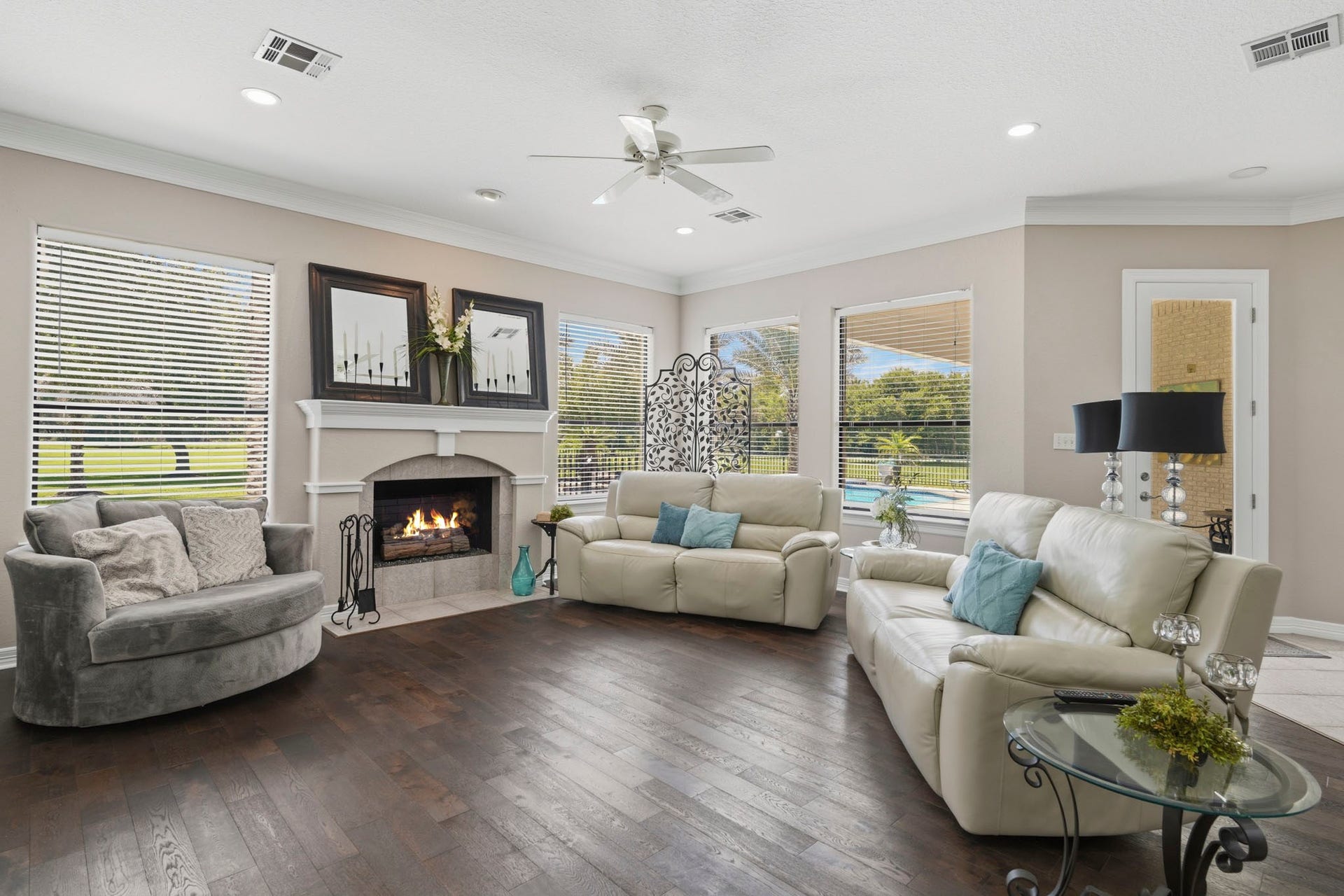835 Hall Road, Alvin, TX 77511 Bright, open living spaces with views toward the pool