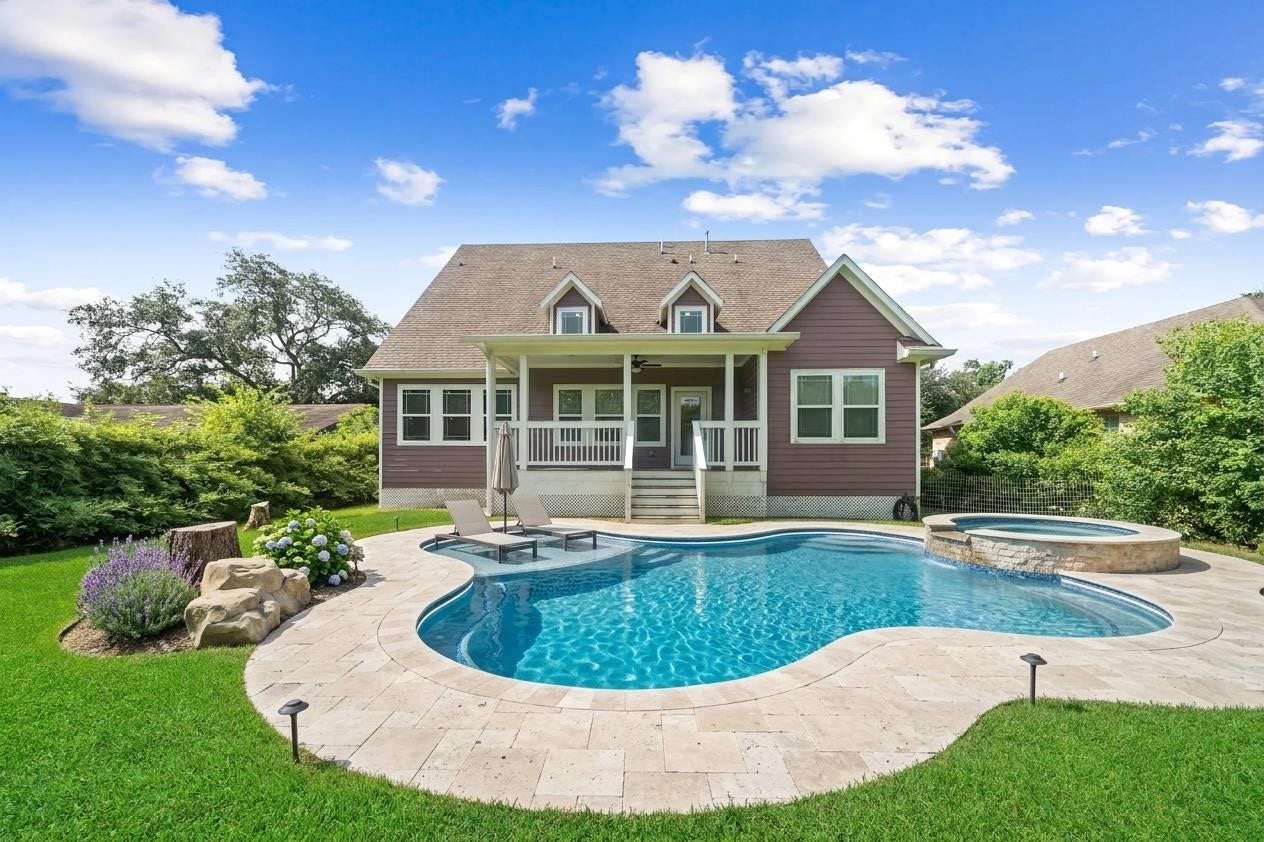 3204 Mckinney Drive, La Marque, TX 77568 Virtually staged backyard with pool and spa.