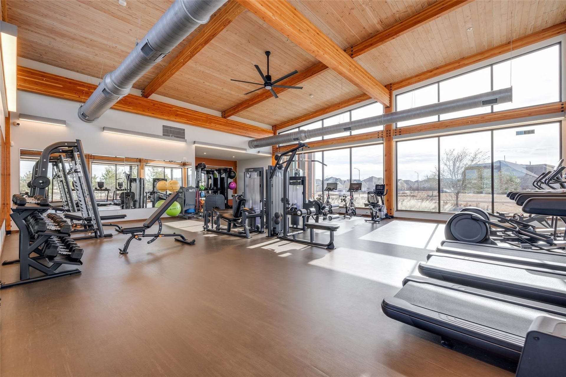24407 Green Buffalograss Trail, Katy, TX 77493 Stay active close to home with access to Elysons well-equipped community fitness center. Floor-to-ceiling windows fill the space with natural light, while a variety of cardio and strength-training equipment makes it easy to maintain your fitness routine without leaving the neighborhood.