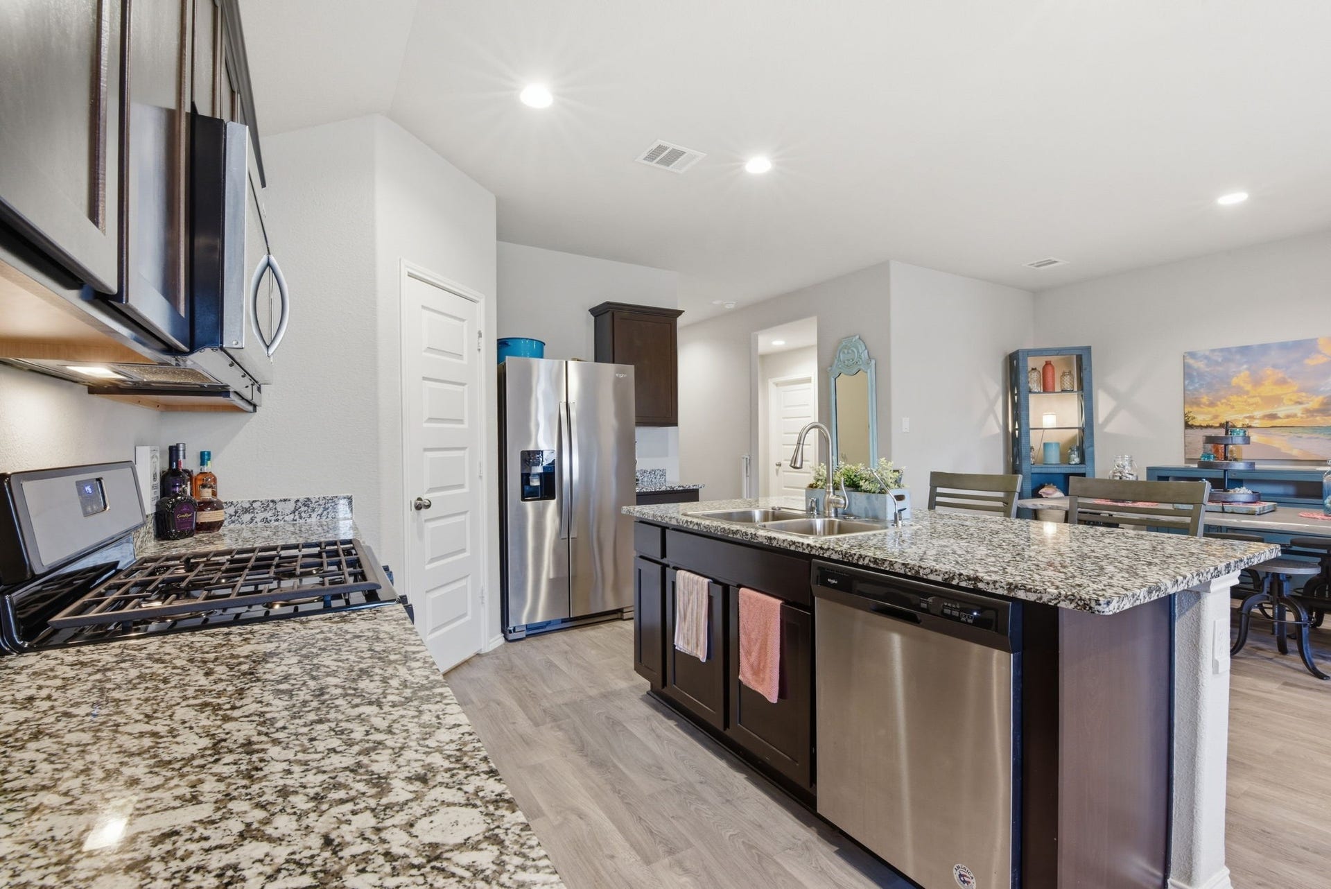 11225 34th Avenue N, Texas City, TX 77591 Equipped with gas cooktop, microwave, dishwasher, and energy-efficient appliances.