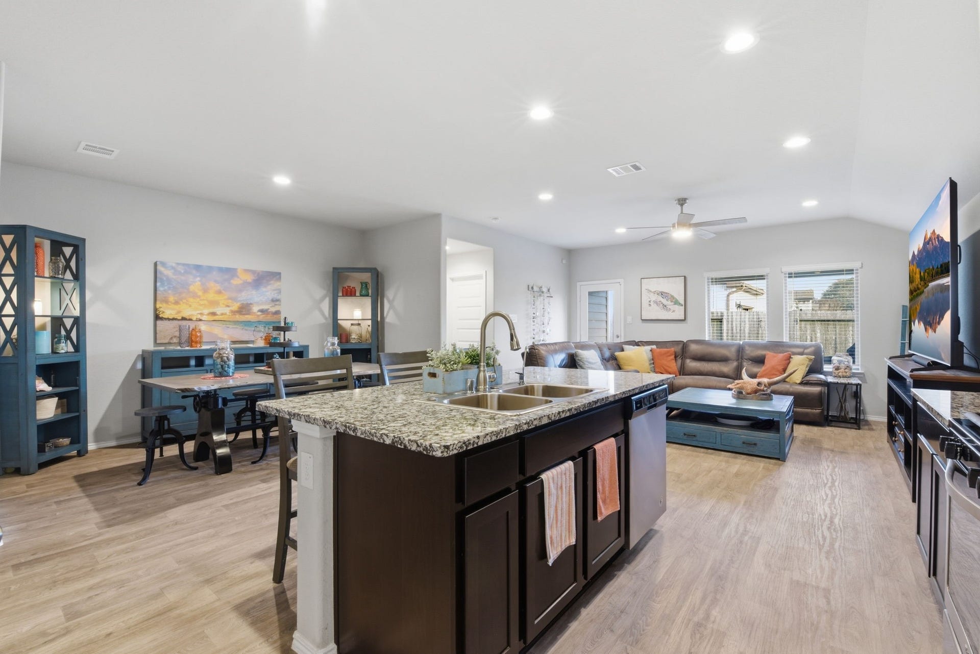 11225 34th Avenue N, Texas City, TX 77591 Modern kitchen with island, breakfast bar, and open layout to living room.
