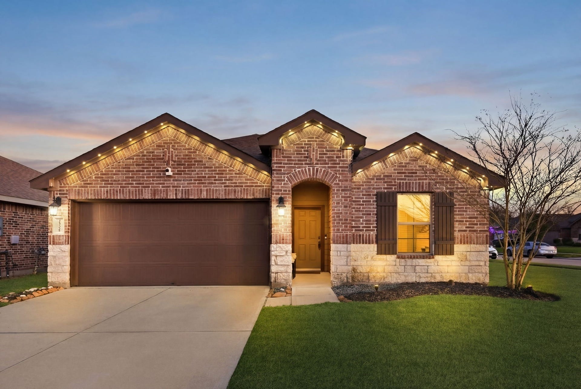 11225 34th Avenue N, Texas City, TX 77591 Move-in ready home with outdoor night lighting enhancing ambiance and security.