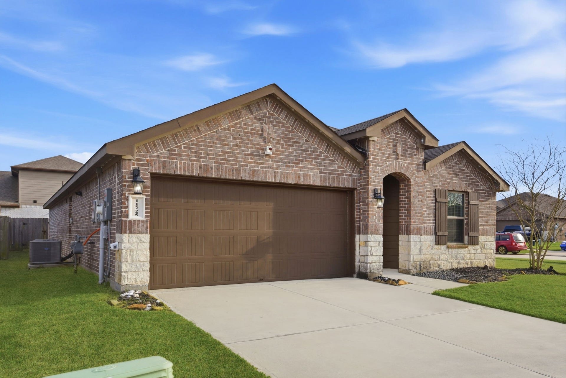 11225 34th Avenue N, Texas City, TX 77591 Attractive front elevation with well-maintained landscaping and clean design.