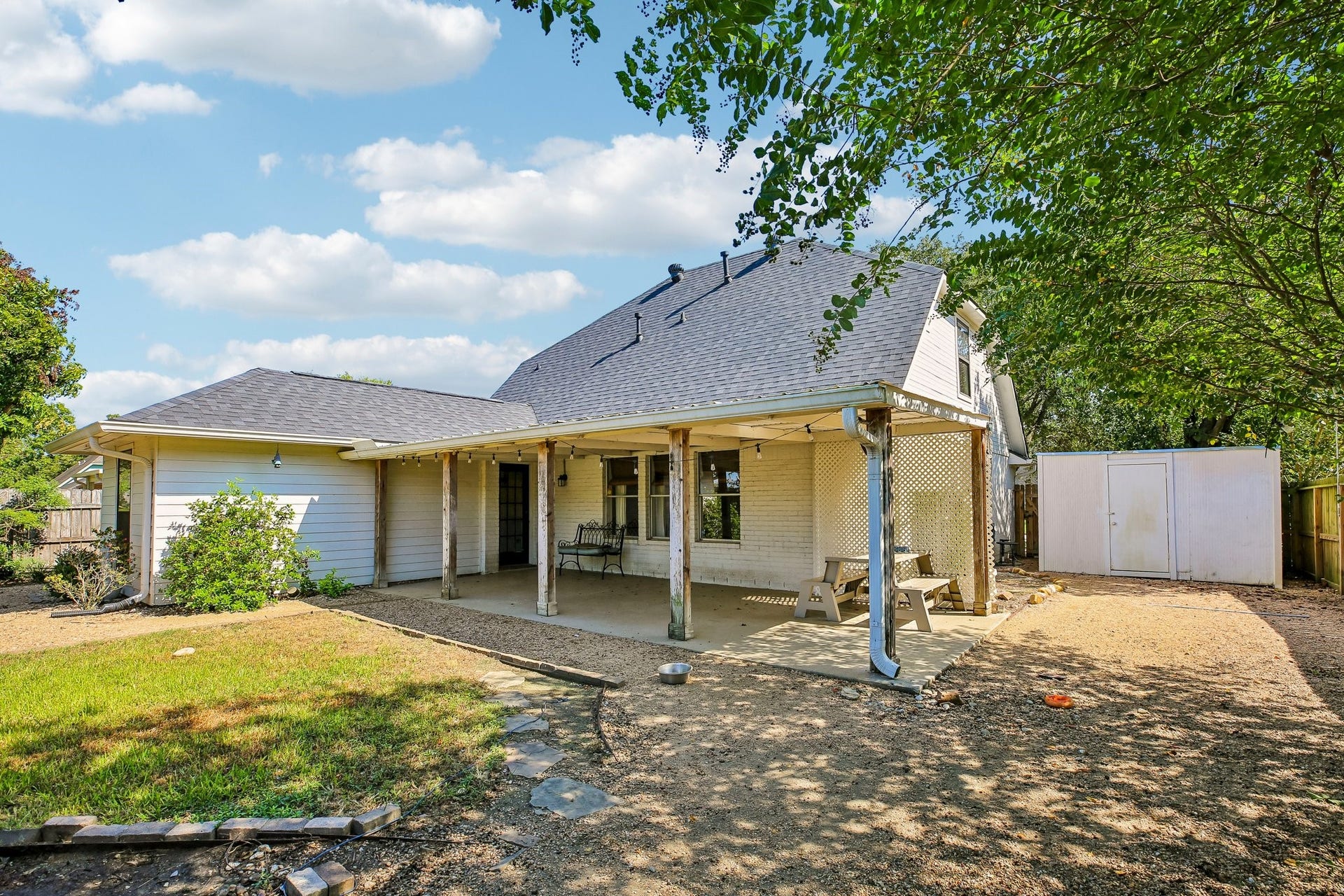 5501 Pecos Street, Dickinson, TX 77539 Side yard with storage