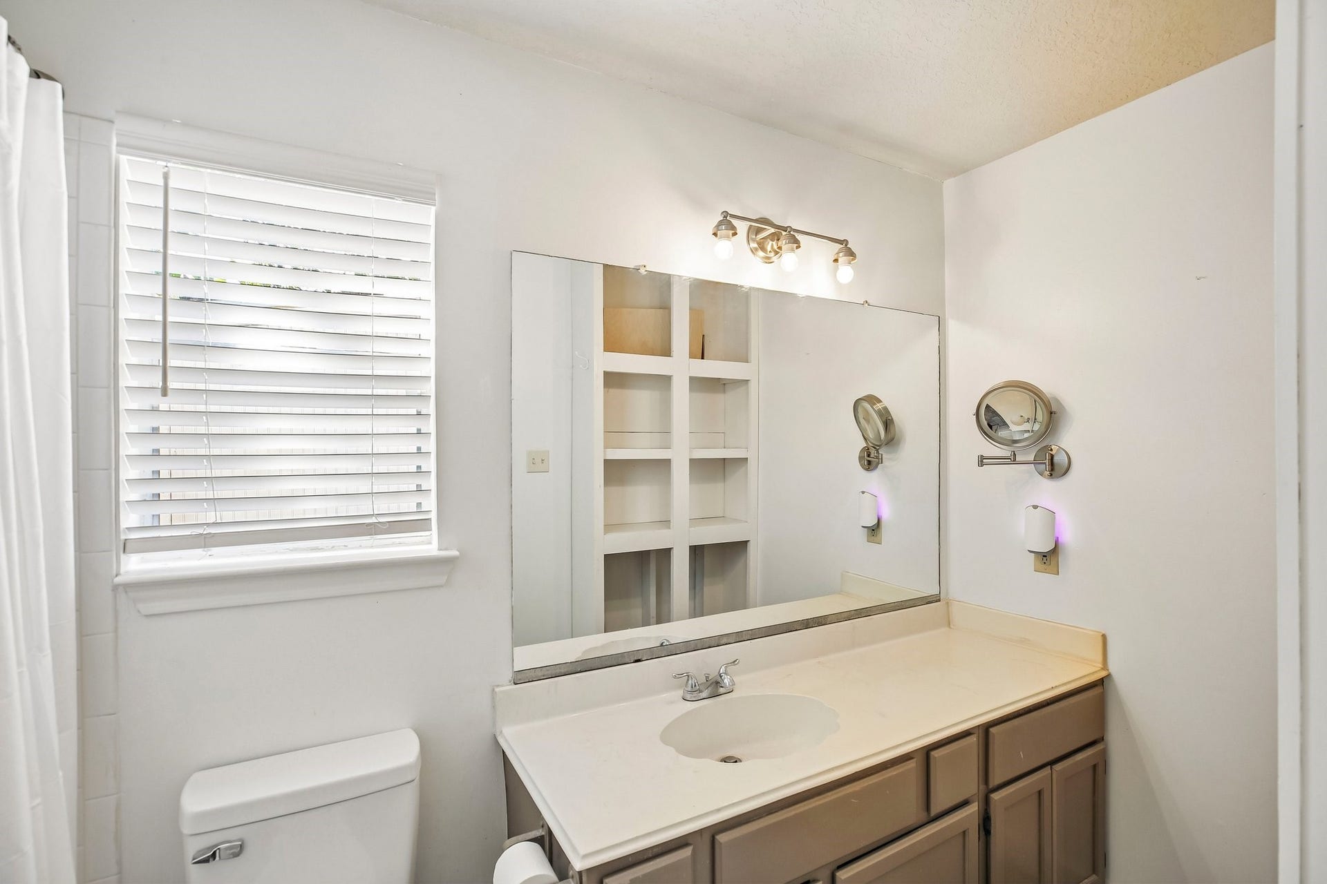 5501 Pecos Street, Dickinson, TX 77539 Primary bathroom with plenty of counter space.