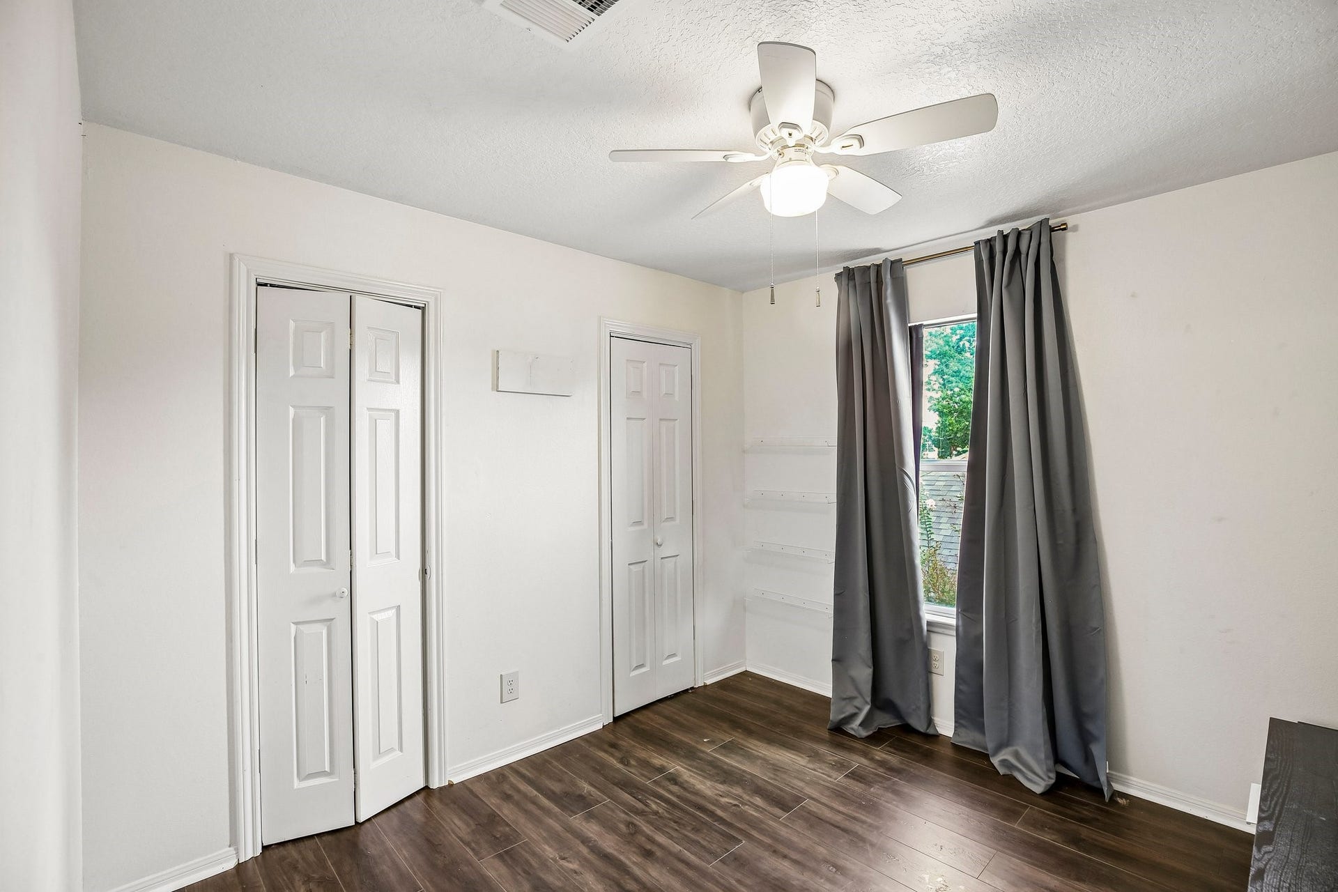 5501 Pecos Street, Dickinson, TX 77539 Secondary upstairs bedrooms. One of the closets has attic access.