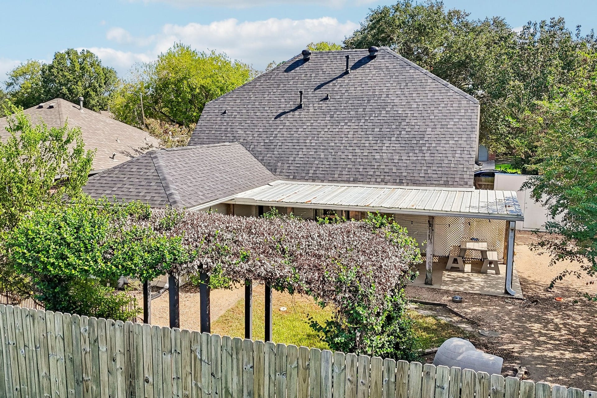 5501 Pecos Street, Dickinson, TX 77539 Pergola at the rear of the backyard for additional seating.