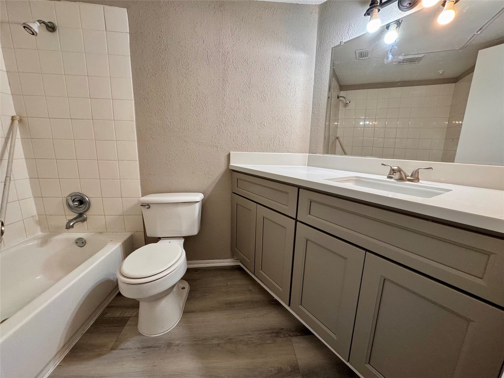 10811 Richmond Avenue, #54, Houston, TX 77042 downstairs bathroom with new vanity and floor