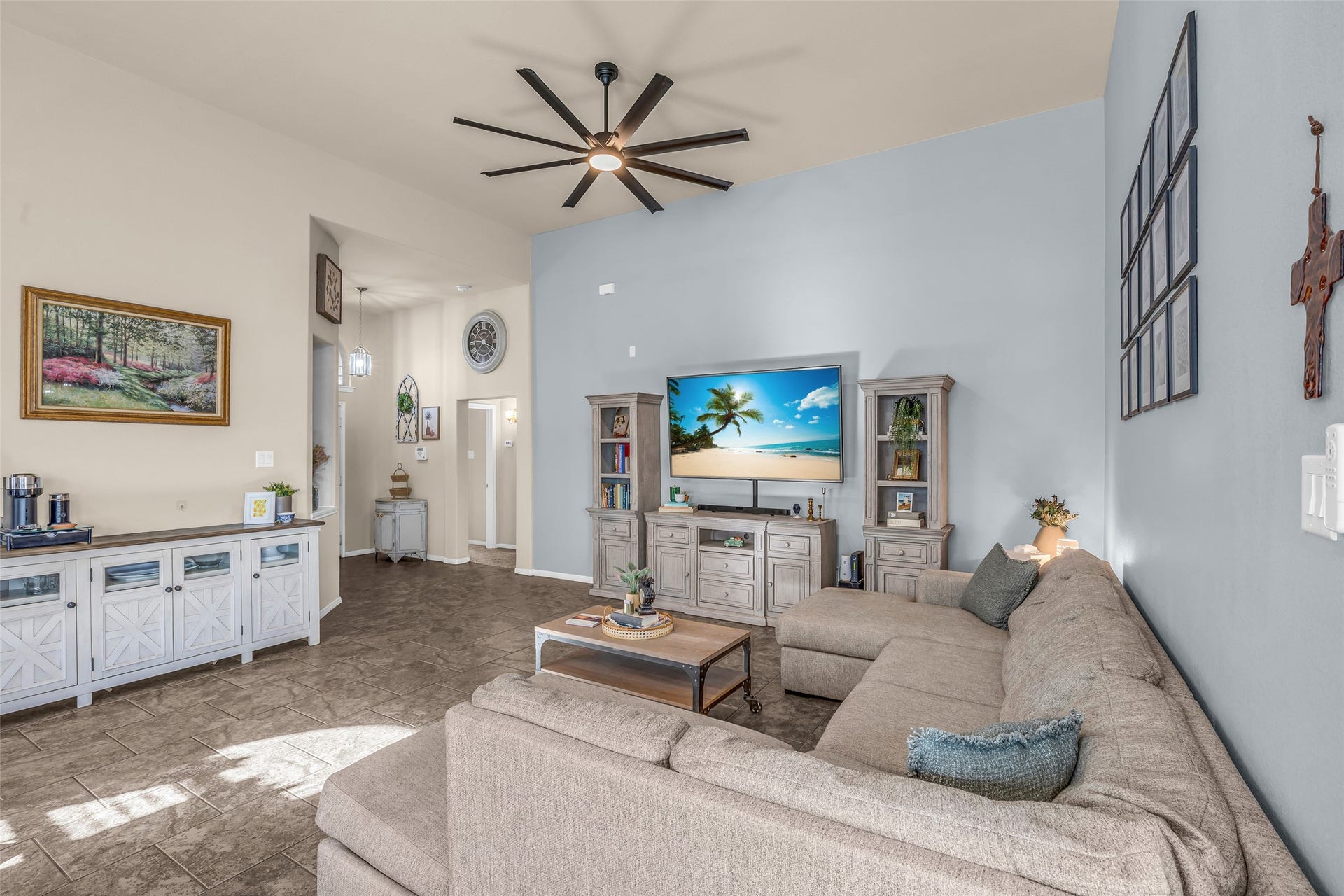 This view provides sightlines to the front Entry and hallway leading to secondary bedrooms and a full bath.