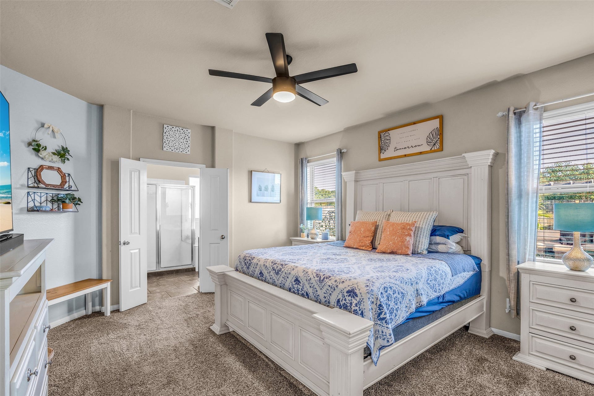 Rest easy in the Owner's Retreat with ceiling fan, plush carpet, and fantastic light streaming in from outside. Bring your bold furniture - it'll fit!