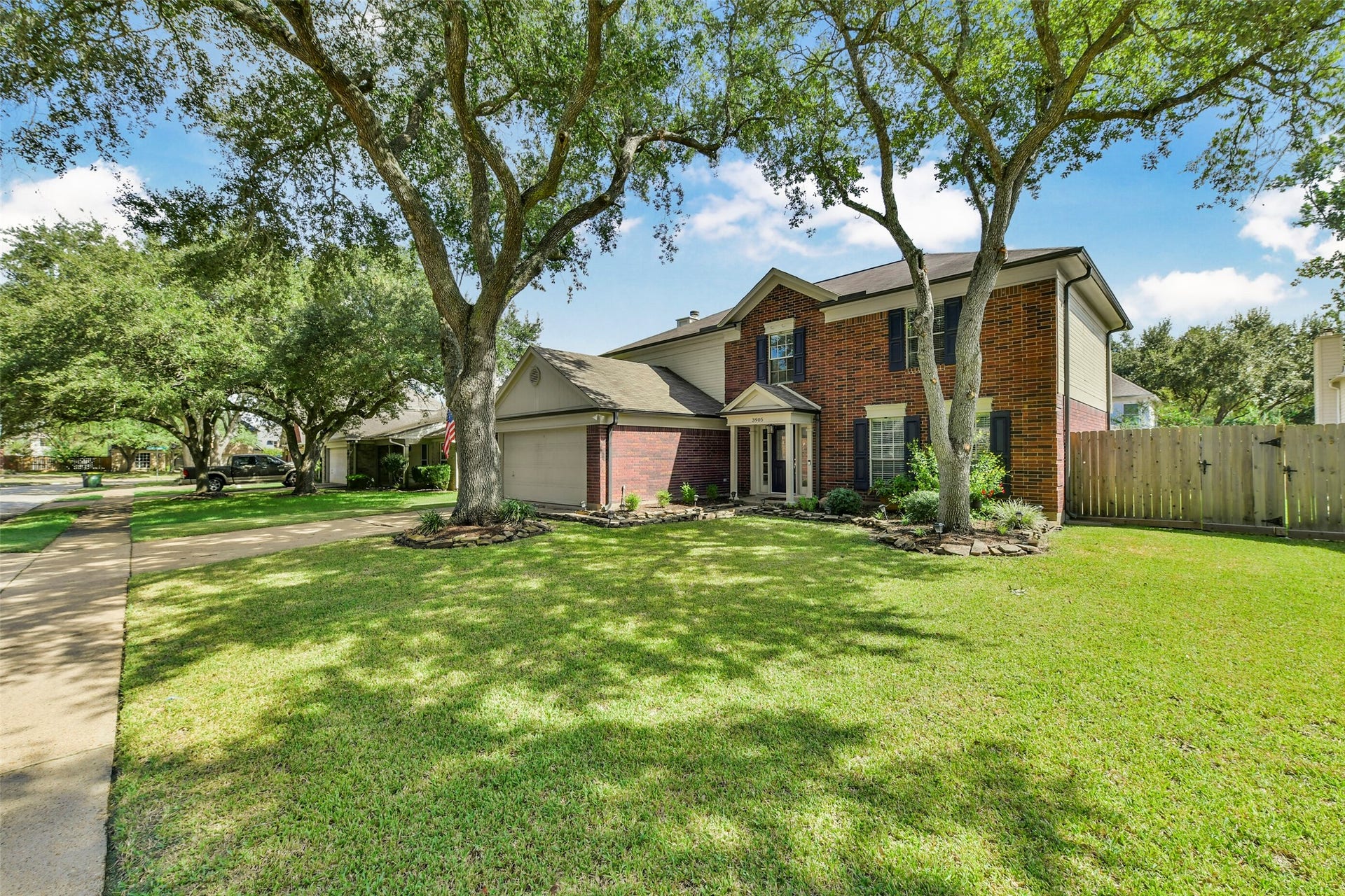 3905 Spring Circle Drive W, Pearland, TX 77584 Mature front yard trees