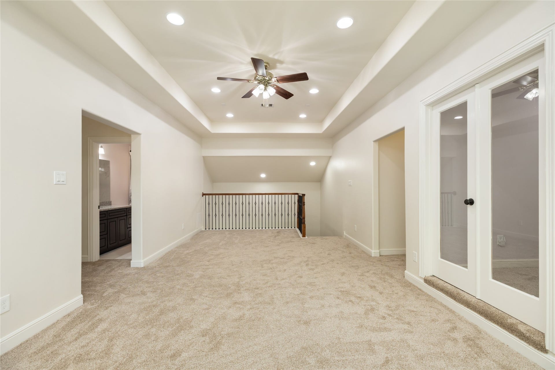 Upstairs game room or second living room with new carpet