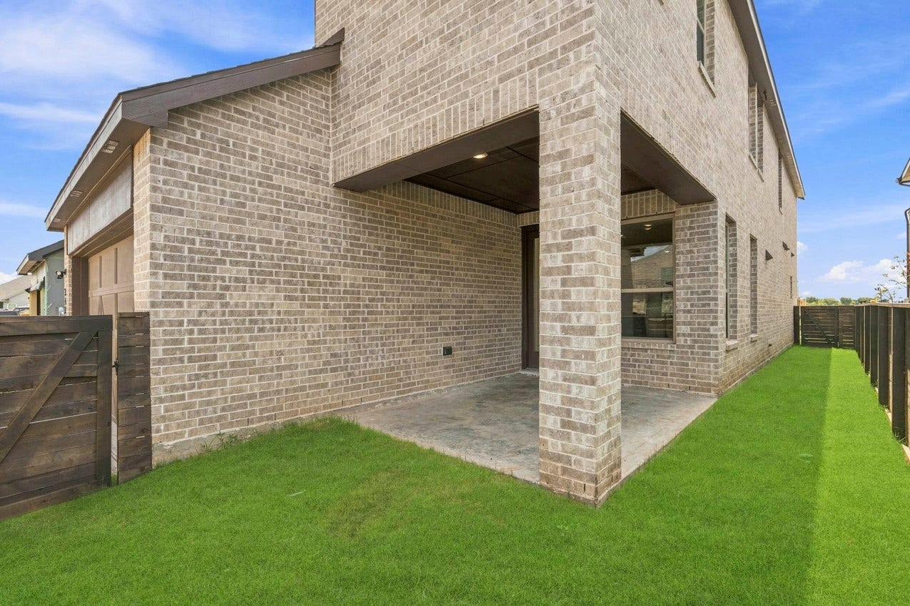3431 Loam Lane, Richmond, TX 77406 The inviting backyard porch offers a charming space to relax, entertain, and enjoy the outdoors.