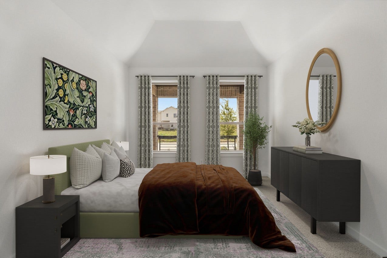 3431 Loam Lane, Richmond, TX 77406 A cozy primary bedroom features soft natural light streaming through its windows, creating a calm and restful retreat.