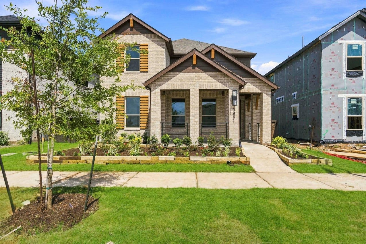 3431 Loam Lane, Richmond, TX 77406 A Highland Homes Rivera plan is a beautifully designed home featuring an open concept layout, spacious living areas, and elegant architectural details that balance comfort and style. Elevation AP