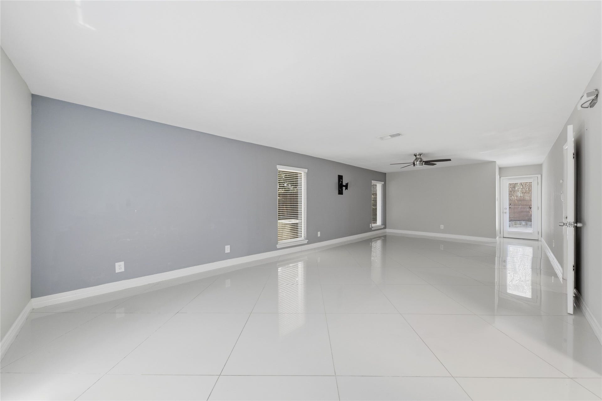 703 Queensmill Court, Houston, TX 77079 The spacious primary suite features a fully updated, spa-like ensuite bath and walk-in closet.