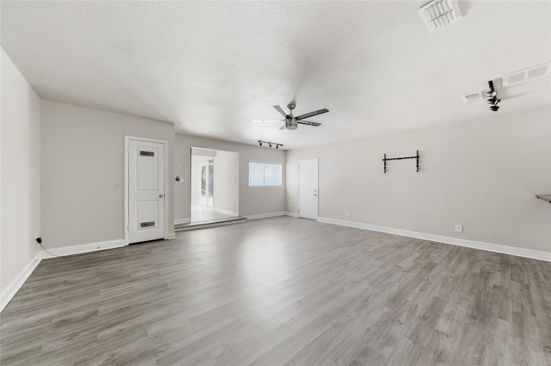 703 Queensmill Court, Houston, TX 77079 Generously sized room featuring natural light and versatile space.