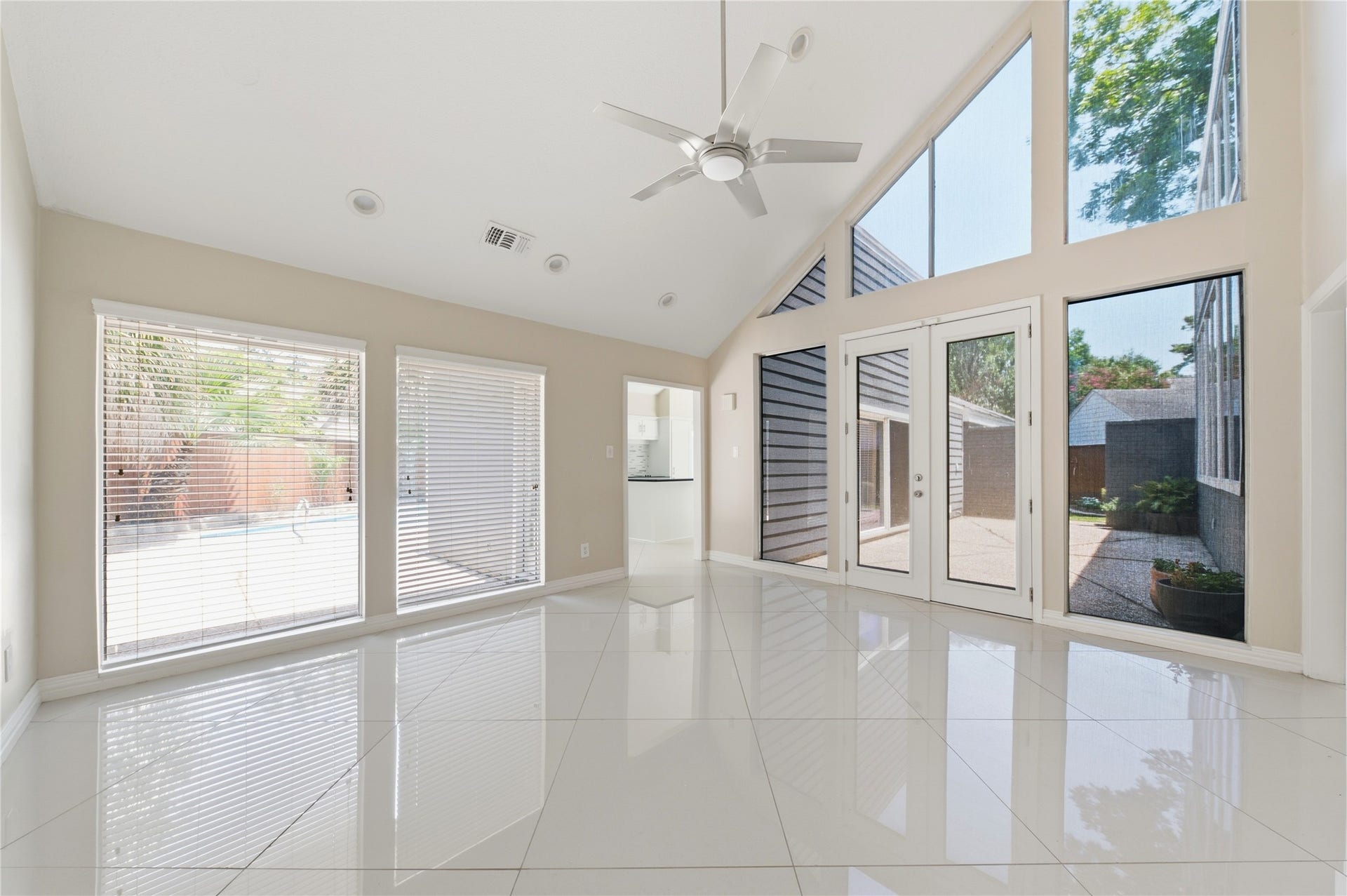 703 Queensmill Court, Houston, TX 77079 Expansive windows bring the beauty of the outdoors inside.