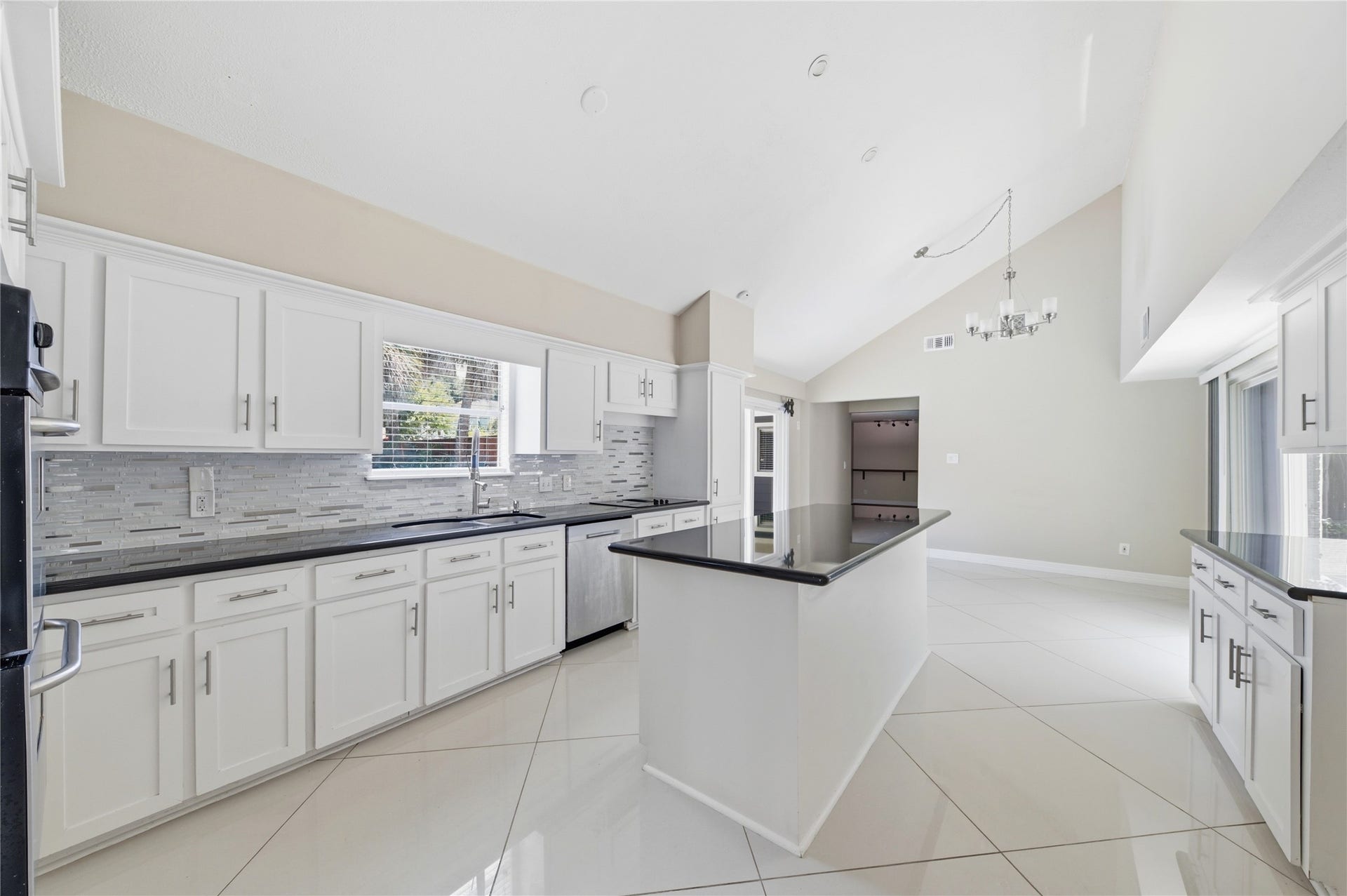 703 Queensmill Court, Houston, TX 77079 Chef's dream kitchen with sleek, modern upgrades.