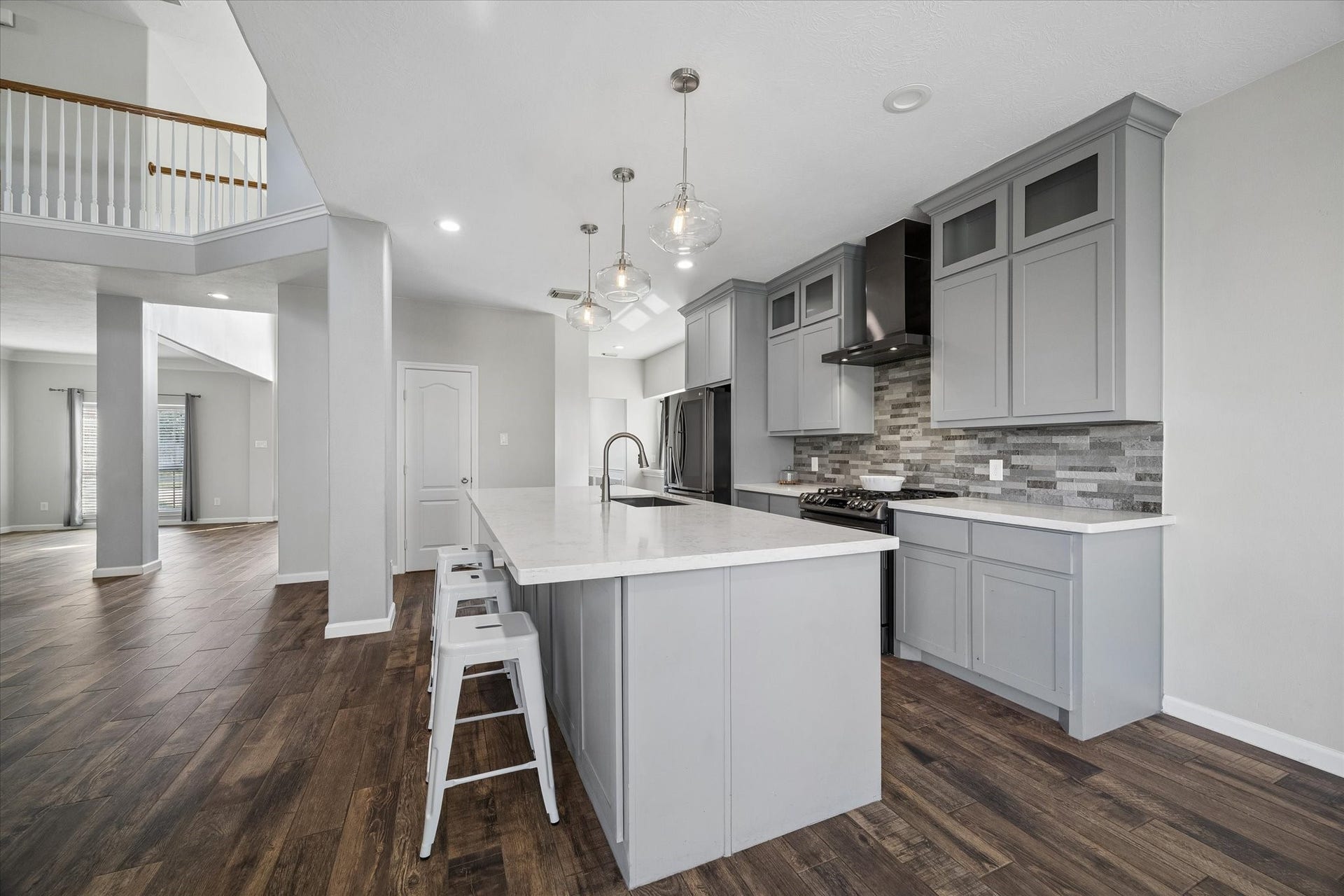 21519 Black Opal Lane, Kingwood, TX 77339 Lots of counter space and storage complete your new kitchen! The door in the center opens to a full PANTRY.