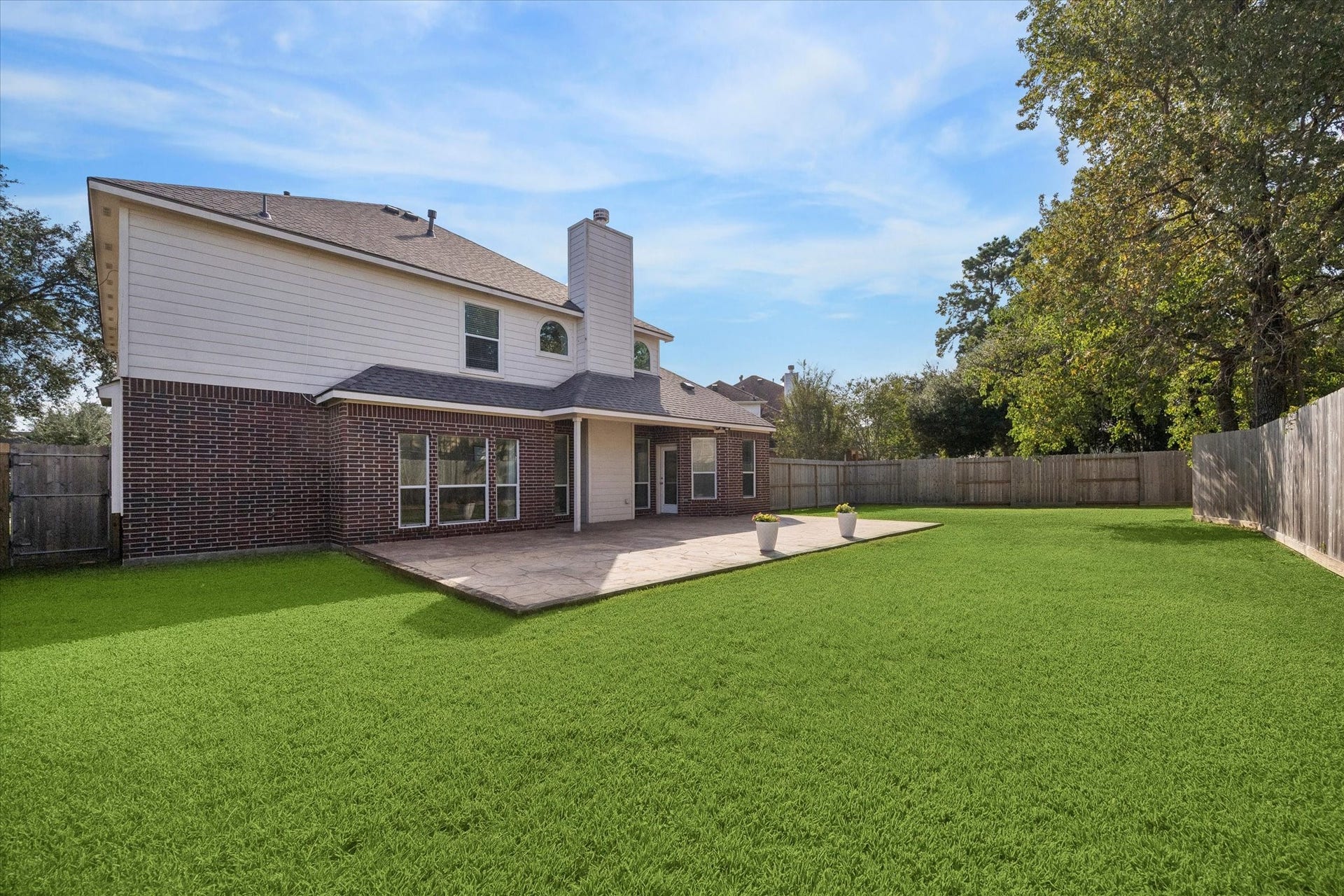 21519 Black Opal Lane, Kingwood, TX 77339 The lawn is a blank slate - leave it as is to give everyone room to run and roam, design garden areas, or even add a pool! Create your dream backyard oasis!
