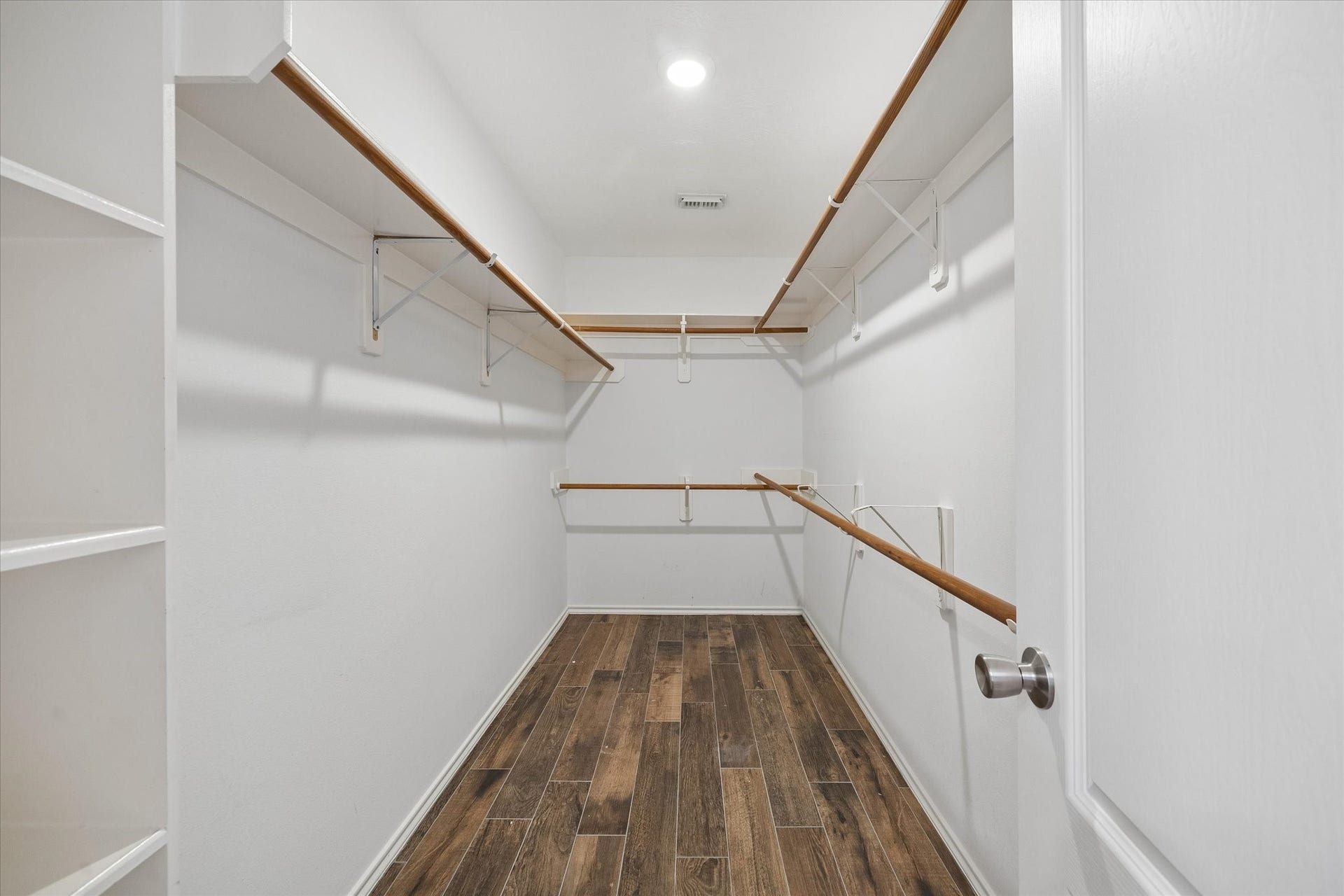 21519 Black Opal Lane, Kingwood, TX 77339 The large walk-in closet has built-in shelves making it easier to stay organized.
