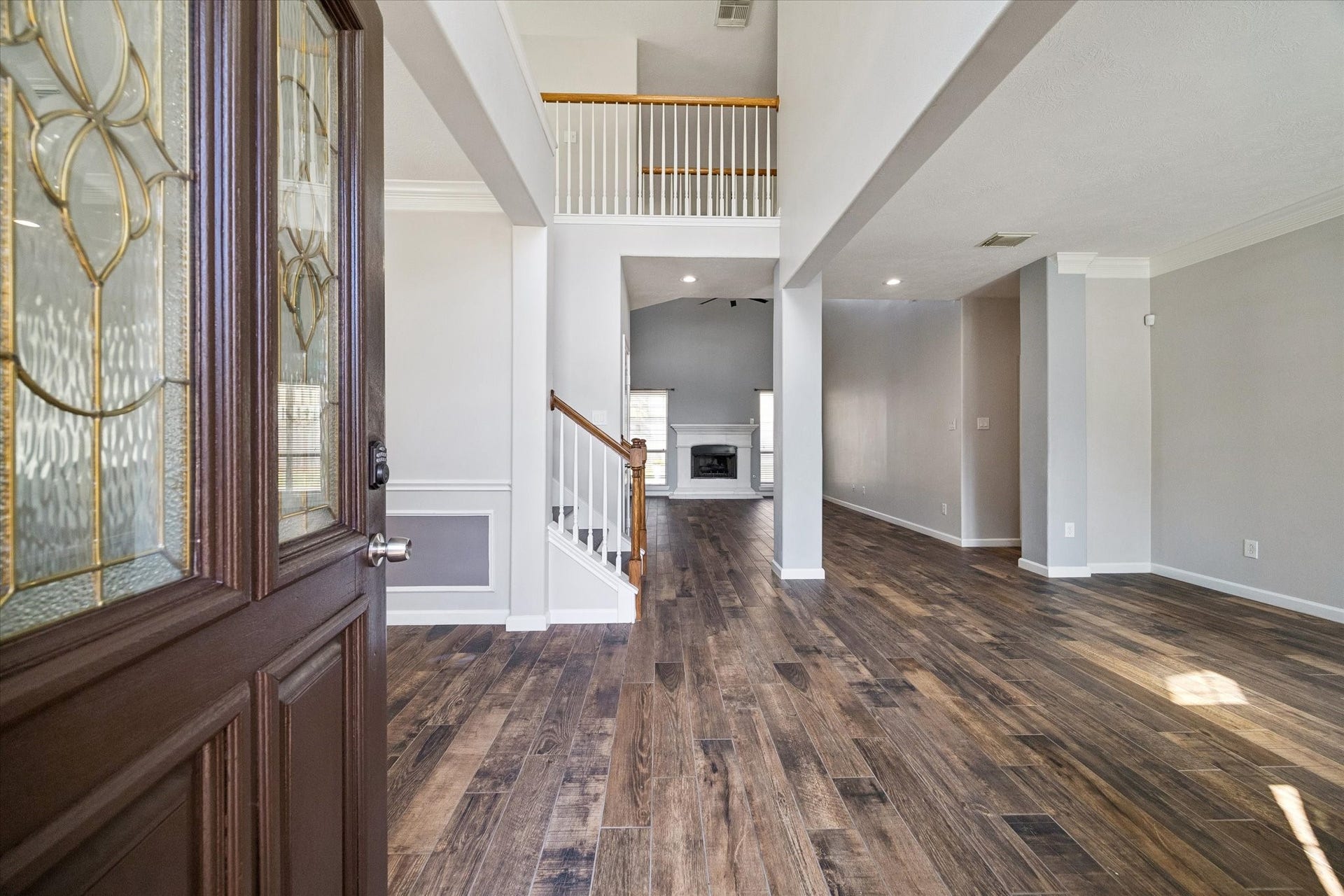 21519 Black Opal Lane, Kingwood, TX 77339 Inside you'll find SOARING CEILINGS in the entryway and OPEN SPACES to welcome your guests. Beautiful CONSISTENT FLOORING runs throughout the common areas.