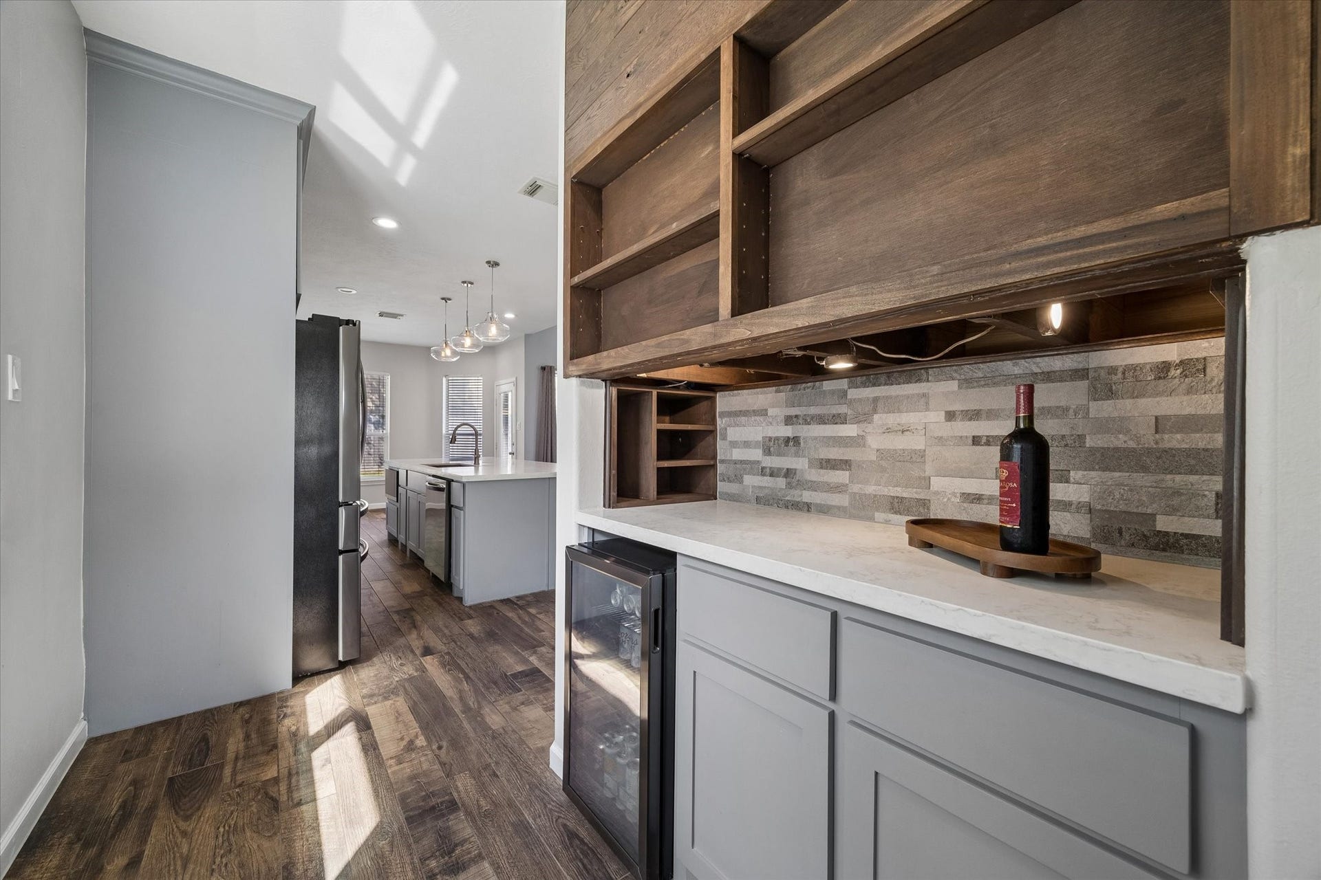 21519 Black Opal Lane, Kingwood, TX 77339 Great extra storage and the beverage fridge is included!