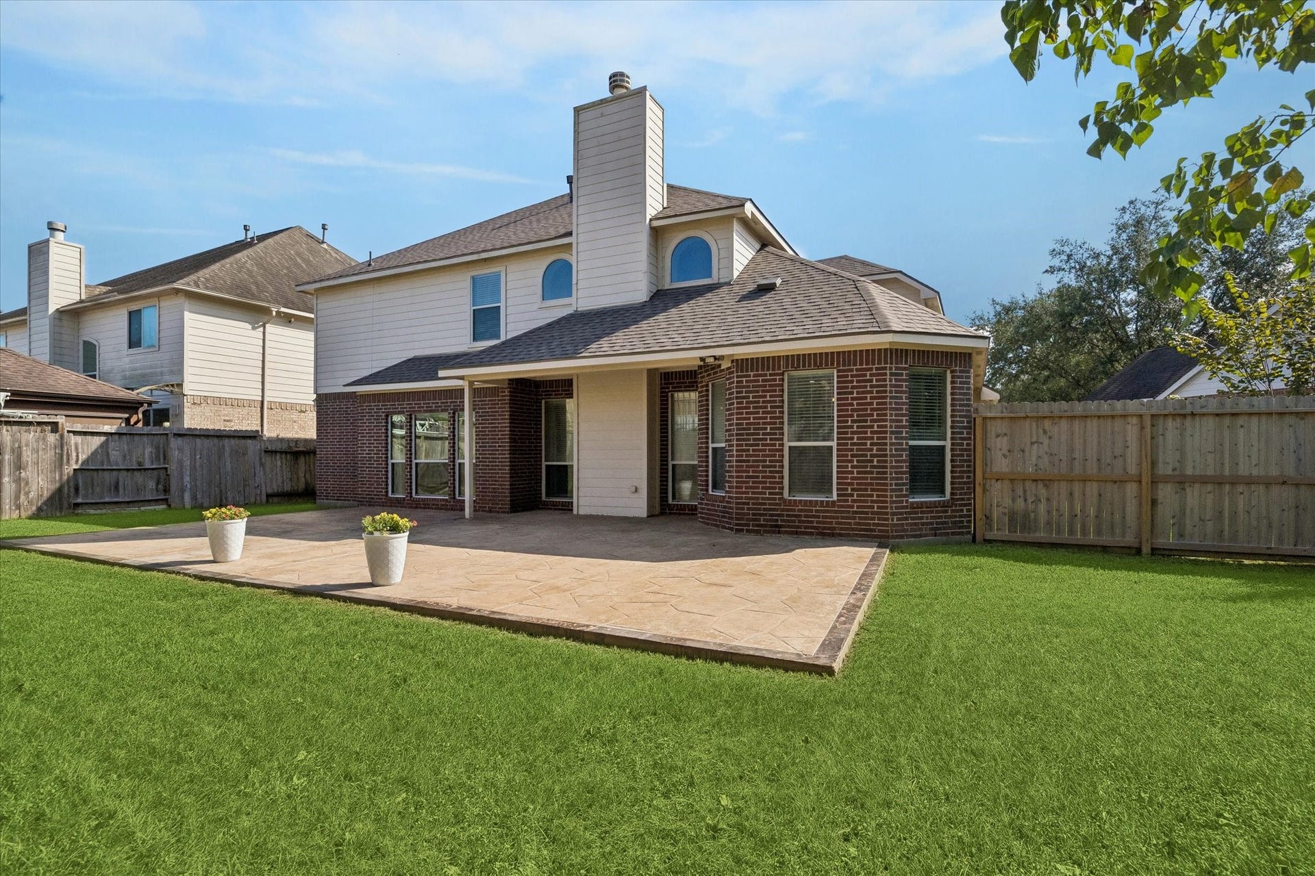 21519 Black Opal Lane, Kingwood, TX 77339 A HUGE PATIO and plenty of lawn space is ready for you and your family and friends to gather and create fun, lasting memories!
