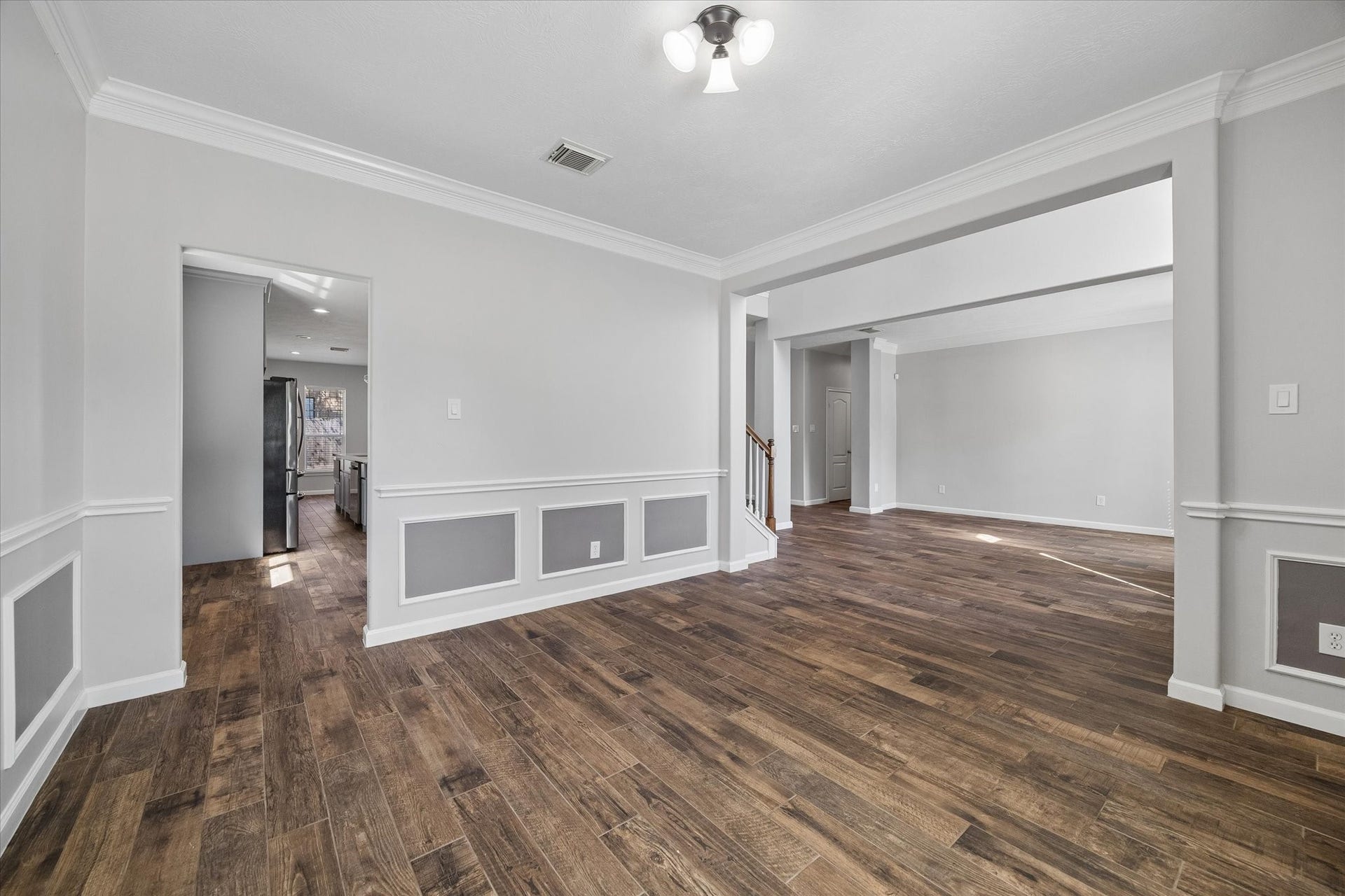 21519 Black Opal Lane, Kingwood, TX 77339 The dining room connects to a dry bar/butler's pantry and kitchen through the doorway on the left making entertaining a breeze!