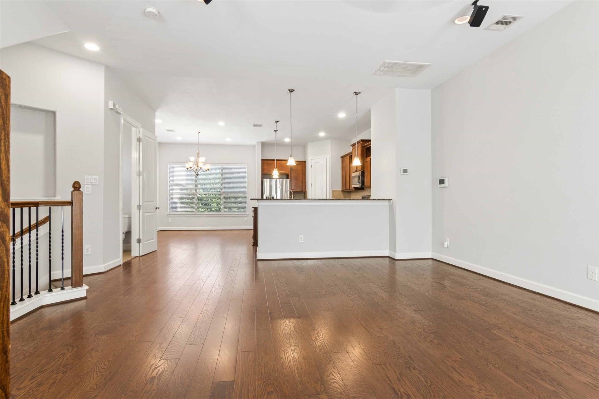 2811 Clay Street, Houston, TX 77003 Living room opens into kitchen and breakfast area.