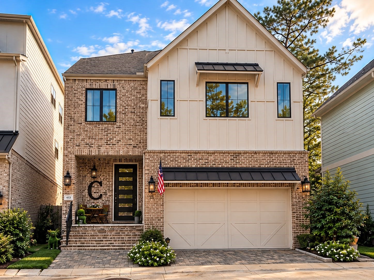 413 Forest Reserve Place, Houston, TX 77079 Beautiful two-story home featuring a brick and board-and-batten exterior, modern black-framed windows, a covered entry, and an attached two-car garage.